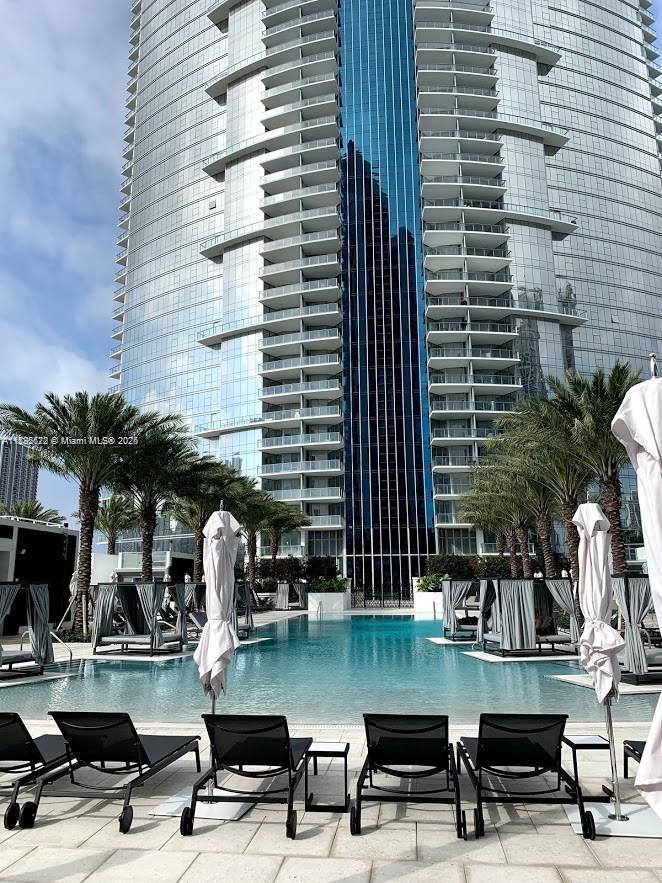 PRICED TO SELL! Welcome to Paramount Miami World Center the most amenity filled condo building in Downtown Miami. This 58 Story building has everything you need. Enjoy Sunsets from your Living Room & Bedroom. Gorgeous White Tile Floors, 10 ft high ceilings, den/office, 2 balconies, Bosch appliances, Quartz Counter tops, Italian cabinets, custom built kitchen pantry, Marble kitchen back splash, marble floors in the master bathroom, Double Vanities in Master Bathroom, and more. Some of the Amenities include Basketball, Racquetball, Tennis, Soccer, Boxing, Golf Swing Simulator, Multiple Resort Style Pools, Spa, Observatory, Amazing views of Miami and more. Call now to view this property.