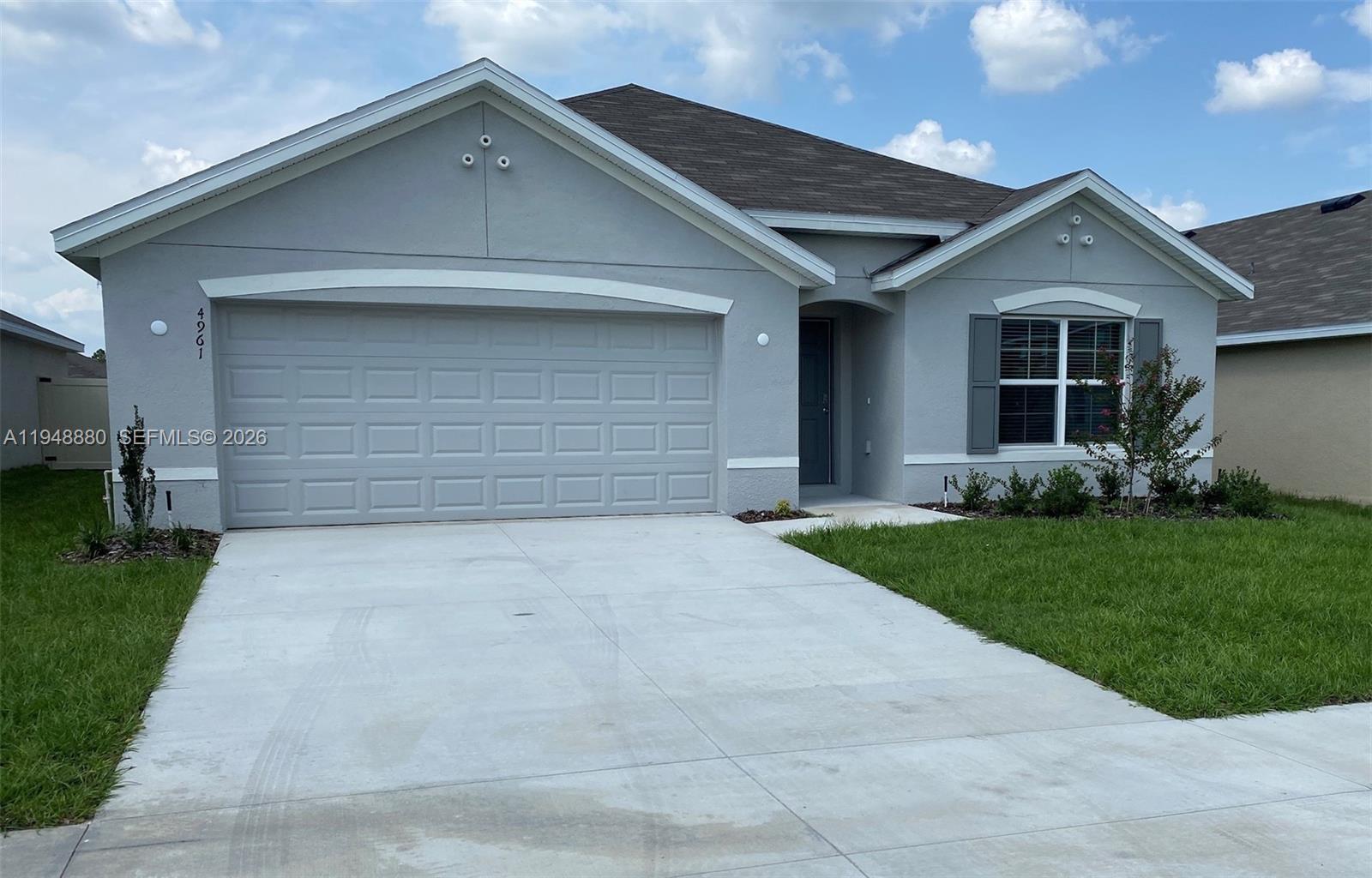Welcome home to Greystone Hills community, a gated community with a prime Ocala location. Built with concrete block. Single - family home features 4 Bed & 2 Bath and 2-
cargarage. All brand new for his family. Granite countertops and newer stainless-steel appliances. Tile flooring and carpet in bedrooms, 8' ceilings create a spacious feeling. With a
laundry room. Enjoy a community pool and cabana. Comfort is at your fingertips. Located in a gated community and close to schools: 0.8 miles from Hammett Bowen Elementary
School and Liberty Middle School and only 5 miles from West Port High School. Surrounded by numerous parks and preserves, within easy reach of major thoroughfares like I-75,
and the newly built World Equestrian Center, this house is the perfect place to call home.