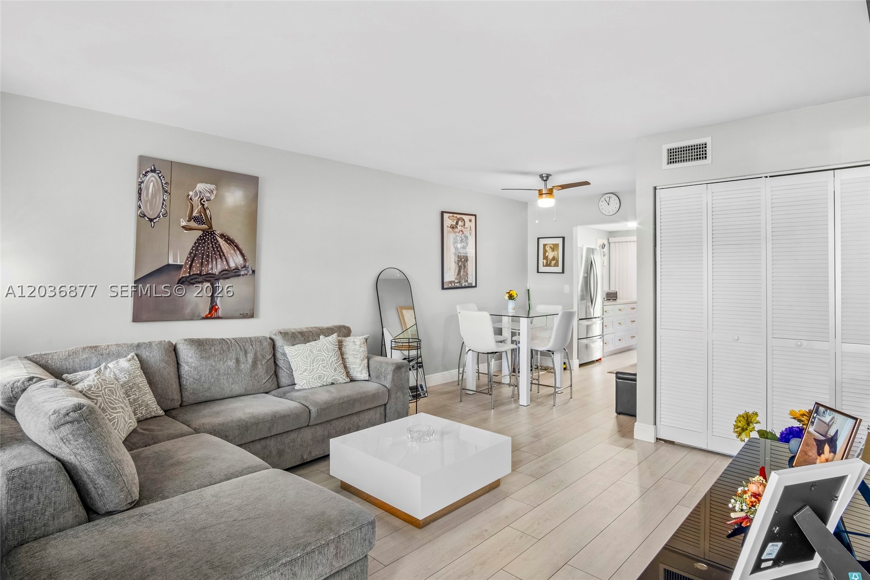 Enjoy easy living in this move-in-ready first-floor residence located in the sought-after 55+ community of Abbey Village. Well maintained and thoughtfully updated, the home features impact windows, a newer A/C, updated appliances, custom paint, and abundant storage throughout. The kitchen offers granite countertops, stainless steel appliances, and direct access to the enclosed patio. Sliding glass doors from both the living area and bedroom create a seamless connection to this versatile space, ideal for relaxing year-round. Laminate flooring runs throughout the home for a clean, low-maintenance finish. Residents enjoy access to a wide range of amenities including a pool, spa, fitness center, tennis courts, clubhouse, game room, and courtesy transportation. Conveniently located near major highways and just minutes from downtown Delray Beach's shopping, dining, entertainment, and cultural attractions. Furniture negotiable.