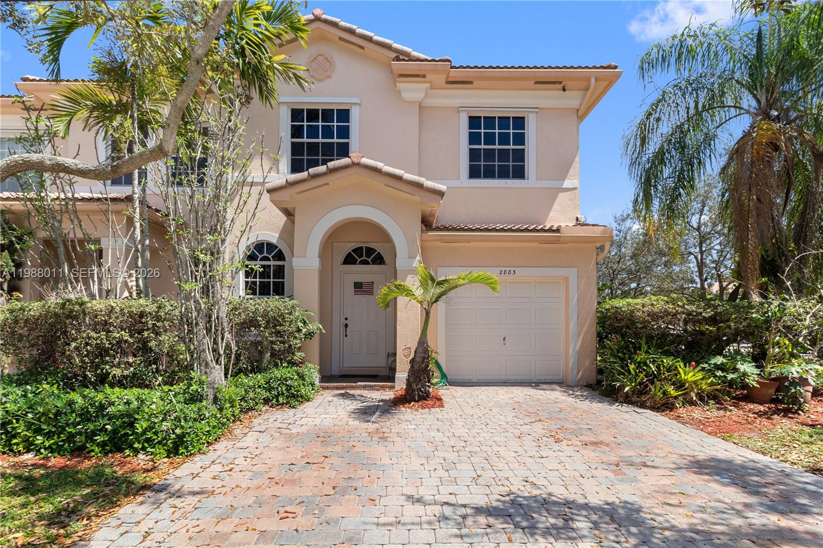 Corner-lot townhome in the heart of Miramar. Proudly owned by the original owner since pre-construction (2005), this well-maintained two-story residence sits on one of the largest lots in the community, offering exceptional privacy and expanded outdoor space rarely available in similar units. The first floor features tile flooring throughout and includes a one-car garage, convenient half bath, spacious living area, and an upgraded kitchen with wood-style cabinetry and sleek black granite countertops—ideal for both everyday living and entertaining. Upstairs, the home offers four bedrooms and three full bathrooms, including an oversized primary suite with a walk-in closet and relaxing Jacuzzi tub. The second floor is finished with clean, well-maintained carpet, while all bathrooms feature tile flooring and a functional, modern design. Three additional bedrooms provide comfortable space for family or guests, each with ample natural light and storage. The secondary bathrooms are well-appointed and designed for everyday convenience. Residents enjoy resort-style community amenities including a state-of-the-art fitness center, oversized swimming pool, tennis court, and children’s playground, enhancing both lifestyle and recreation. A rare opportunity to own a spacious corner unit in a highly desirable community with unmatched lot size and long-term pride of ownership.