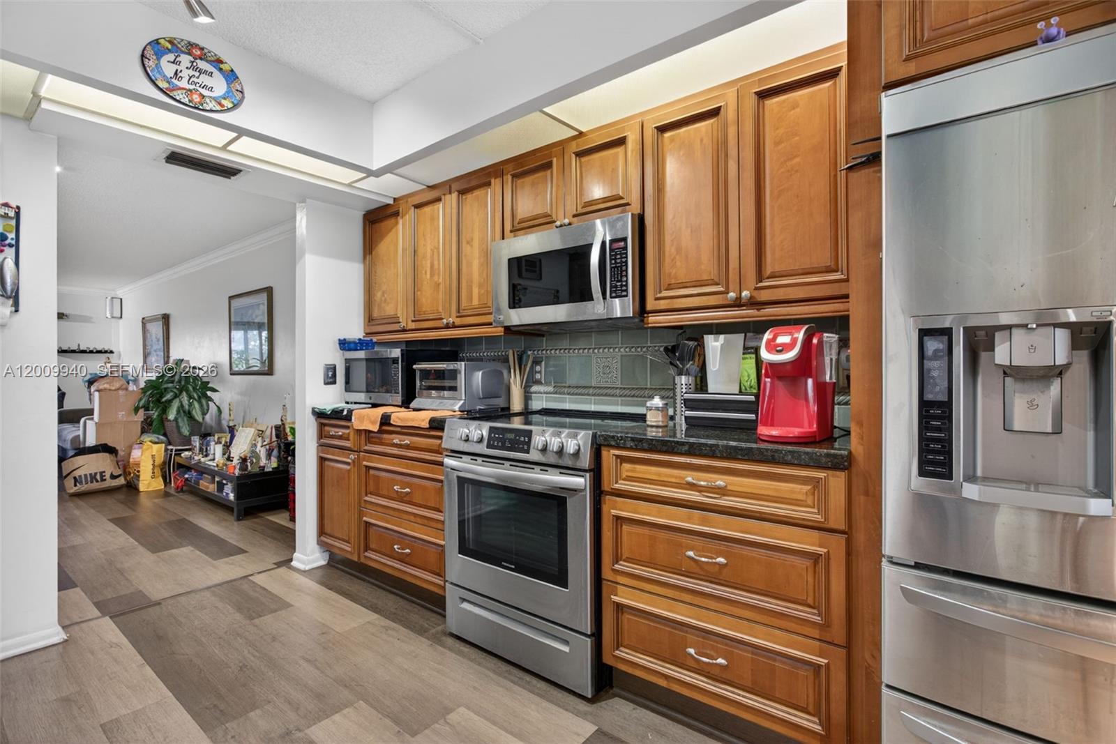 SPACIOUS CONDO! Beautifully maintained residence located in the desirable Wynmoor community in Coconut Creek. This spacious unit offers a remodeled kitchen featuring stainless steel appliances, modern finishes, and ample cabinetry—perfectly blending style and functionality. The bedrooms are generously sized with plenty of storage. Relax and unwind from your private screened balcony, ideal for enjoying the peaceful surroundings. Residents enjoy access to resort-style amenities including pools, a clubhouse, fitness center, golf course, and vibrant social scene. Best value in the community and conveniently located near shopping, dining, and major highways, with easy access to nearby beaches and attractions.