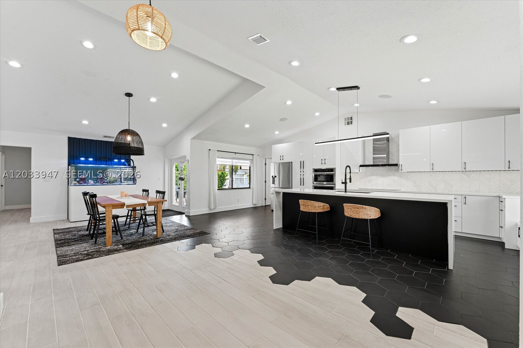 **SHOWINGS BEGIN ON JULY 8 OPEN HOUSE, 5:00-7:30PM** Welcome to this stunning 4-bedroom, 2-bath pool home where contemporary design meets everyday comfort. From the moment you step inside, you'll notice the home's distinctive style, featuring vaulted ceilings, bold designer finishes, statement lighting, and an open-concept layout that creates an inviting atmosphere throughout. At the heart of the home is a beautifully updated kitchen complete with a large waterfall island, sleek cabinetry, quartz countertops, 2022 kitchen appliances, and ample space for cooking and gathering. The spacious living and dining areas flow seamlessly together, making it ideal for both everyday living and hosting guests. The spacious primary suite offers peaceful views of the pool, creating a relaxing retreat, and features a large walk-in closet. Multiple windows throughout the home fill each bedroom with abundant natural light. Step outside to your private backyard oasis featuring a saltwater pool, covered patio, and plenty of space for outdoor entertaining. Additional improvements include a 2022 electrical panel and a 2023 A/C, and smart home technology offering added value and peace of mind. Located in the desirable Cypress Run community with NO HOA, you'll enjoy convenient access to parks, shopping, dining, major roadways, and everything Coral Springs has to offer. If you're looking for a home with distinctive style, thoughtful updates, and exceptional indoor-outdoor living, this one is it!