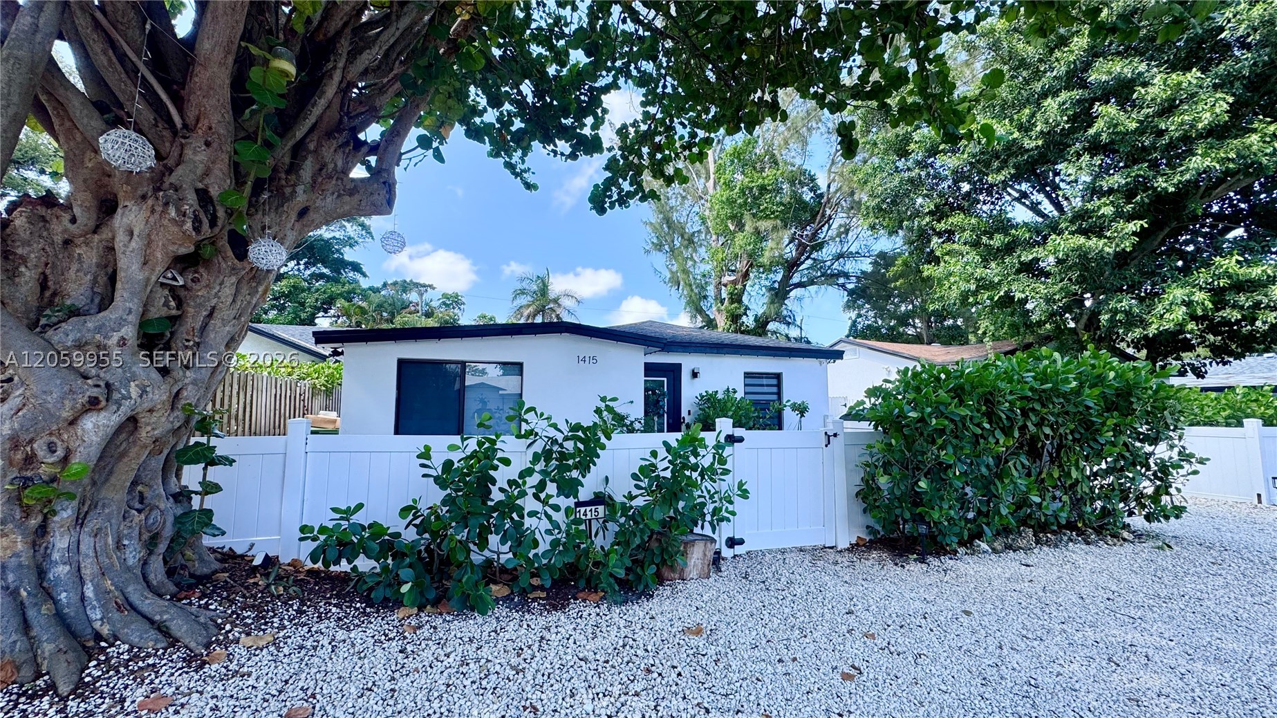Beautifully renovated 2-bedroom, 2-bathroom single-family home in the sought-after Edgewood neighborhood of East Fort Lauderdale. Thoughtfully updated from top to bottom, this residence features a brand-new roof, impact-resistant windows and doors, a new A/C system, Ring doorbell & video surveillance for added security, stylish flooring throughout, and a designer kitchen complete with stainless steel appliances. The backyard features new professional landscaping, creating an inviting outdoor space to enjoy.
