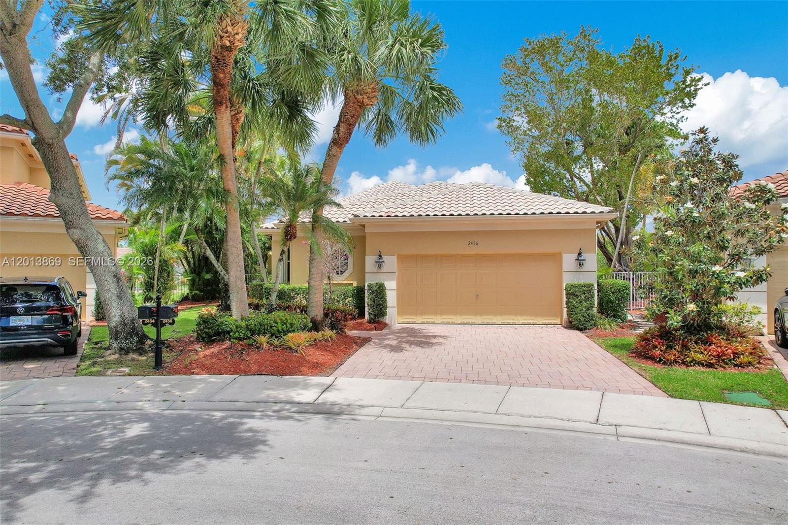 Rare opportunity to own one of the most premier lots in Weston Hills Country Club, showcasing expansive golf course and water views. This one-story residence is ideally positioned on a quiet cul-de-sac and features an open-concept design with volume ceilings, marble flooring, and neutral finishes throughout. The spacious primary suite offers custom built-in closets and a newly renovated bath. Step outside to a resort-style pool and an oversized backyard—perfect for entertaining or family living. Additional highlights include a 2-car garage and professional landscaping. Located within Weston’s top-rated A+ school district. Offered furnished for a turnkey luxury experience.