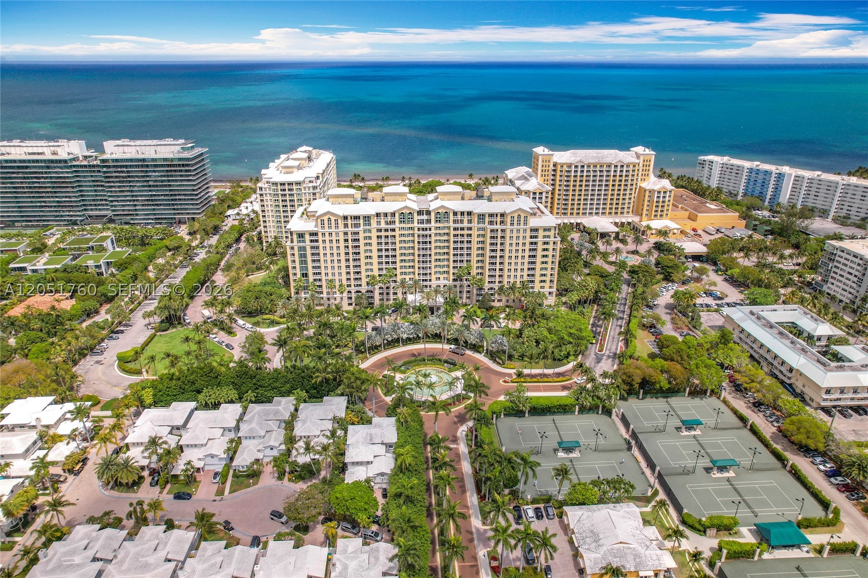Experience refined coastal living in one of Key Biscayne's most prestigious beachfront communities. This turnkey, thoughtfully redesigned 2-bedroom, 2.5-bath residence features bright, open living spaces, a chef's kitchen centered around an oversized island, premium finishes, and timeless design throughout.

Designed for both everyday living and effortless entertaining, the spacious floor plan flows seamlessly to a generous covered terrace overlooking lush tropical landscaping. The luxurious primary suite offers a spa-inspired bath and generous custom closet space, while the guest suite provides exceptional comfort and privacy.

Grand Bay Residences offers 24-hour concierge, valet, a resort-style pool, fitness center, and exclusive beach service through the Grand Bay Club. Ideally located just moments from the Ritz-Carlton, dining, parks, and marinas, this move-in-ready home perfectly captures the best of the Key Biscayne lifestyle.
