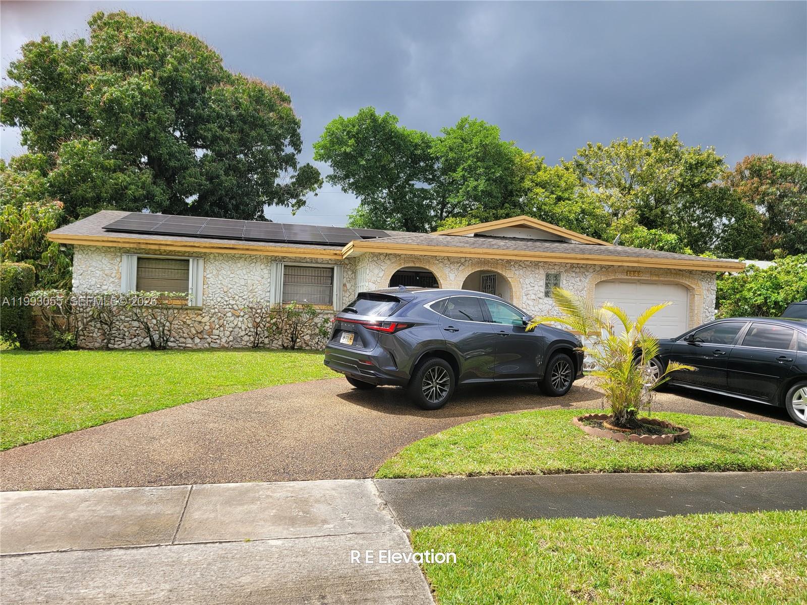 Well-maintained 3-bedroom, 2-bathroom home with a 1-car garage and a spacious, functional layout. Features include a very large den, ideal for a home office, media room, or additional living space. Enjoy a dedicated bar area, perfect for entertaining family and friends. The home is equipped with a gas hot water heater and accordion shutters for added efficiency and storm protection. The fenced-in backyard offers privacy and space for outdoor enjoyment, pets, or gatherings. Conveniently located near schools, shopping malls, sports venues, entertainment, and major highways, providing easy access to everything you need. A great opportunity to own a versatile home in a desirable location.
