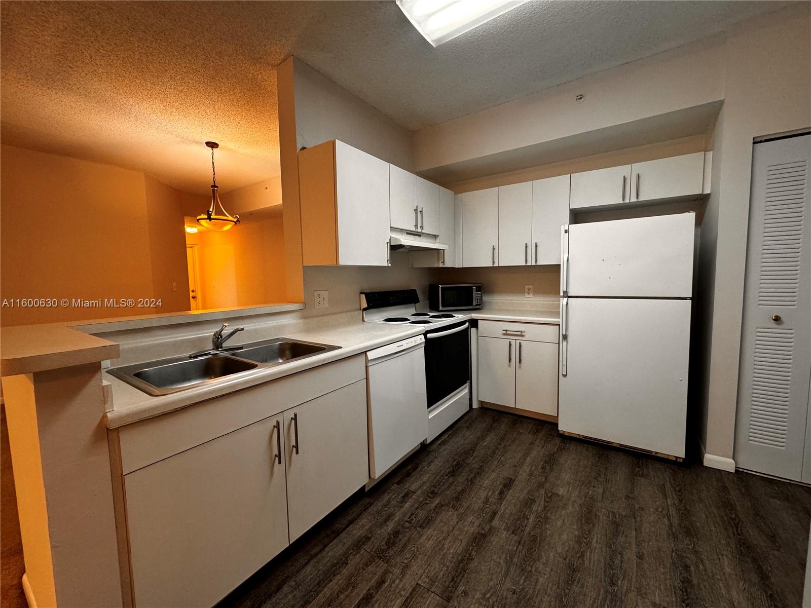 Spacious 2 bedroom 2 bathroom on first floor and minutes from nearby colleges including Nova South Eastern University and FAU Davie Campus, Broward Community College and lots of dining, shopping and quick access to highways. All tenants have to be approved by the condo association which takes generally 2-3 weeks. Vacant and easy to show. Water, Sewer & Trash Included in Monthly rent.