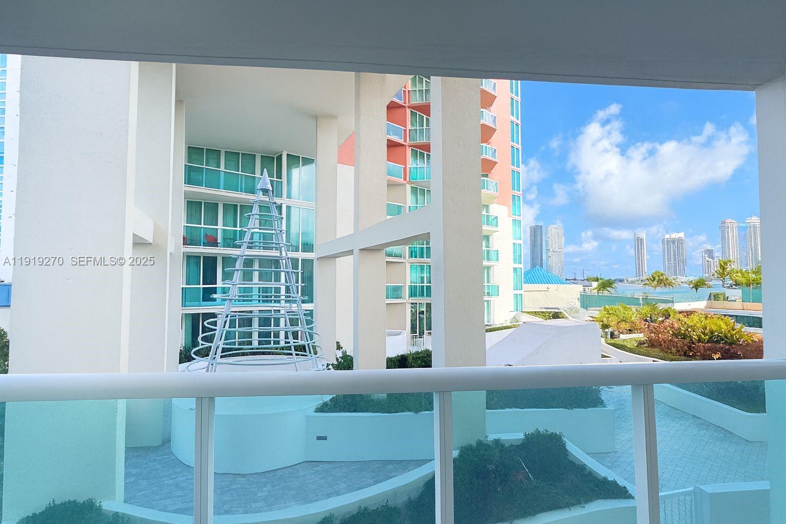 READ BROKER REMARKS. Beautiful 1-bedroom, 1-bath residence in the highly sought-after Hidden Bay community. This well-appointed private condo features elegant marble floors, an open gourmet kitchen with ample counter space, breakfast bar, and granite countertops. The home offers a spacious bathroom, large closet, and a private balcony overlooking the peaceful garden courtyard.

The building provides exceptional amenities, including an elegant lobby, clubhouse, spa, state-of-the-art gym, multiple pools, and four tennis courts. Includes one assigned parking space and one storage unit.
