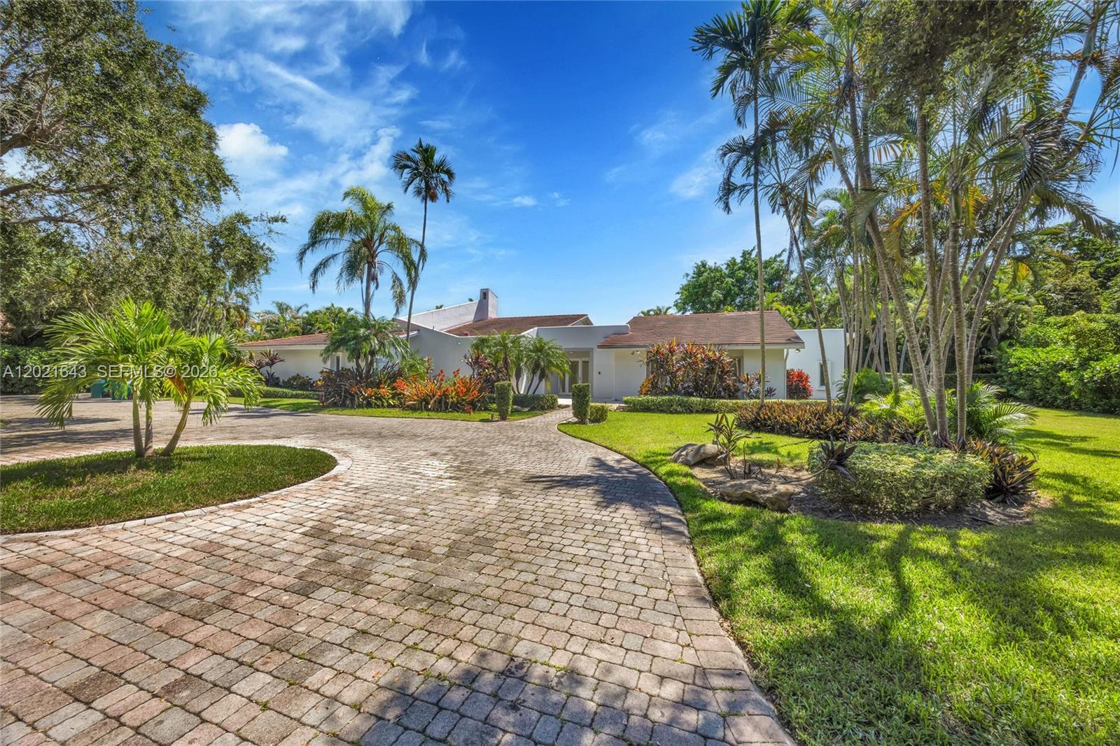 Completely renovated Coral Gables Home! Situated on a gracious 39,493 square foot lot in the prestigious South Gables this lovely home has been thoughtfully updated and is ready to be expanded or rebuilt! The 3,917 square foot home is set back from the street and features 5 bedrooms, 4.5 bathrooms, office, and gourmet kitchen with high-end appliances. The flexible floorplan offers generous living spaces in the living room, dining room, and family room overlooking the pool. Situated privately to one side of the house, the primary bedroom includes a new, spa-like bathroom and oversized closet. The home features a 2 car garage, laundry room, impact glass windows and doors, and a large covered patio.