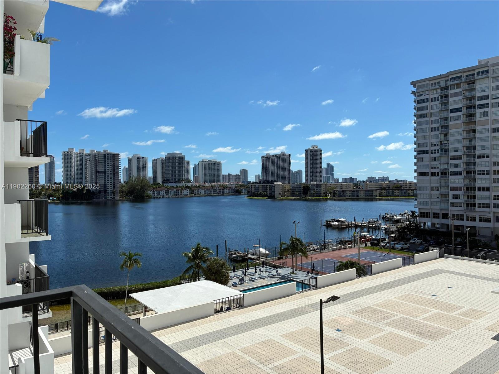 Stunning lake and ocean views from this spacious 2-bed, 2-bath condo in Aventura — all at an incredible value! Located in one of the most walkable communities east of US-1, right at the entrance to Williams Island Blvd, this residence is ready for your personal touch.
The unit comes with a covered parking space next to the entrance. 
Enjoy a well-appointed community with plenty of amenities, including extended cable, high-speed internet, hot water, pest control, water, sewer, trash, 24/7 security, and a fully fenced building. Excellent location close to shopping, dining, and top-rated schools.

A fantastic opportunity to create your dream home in Aventura.