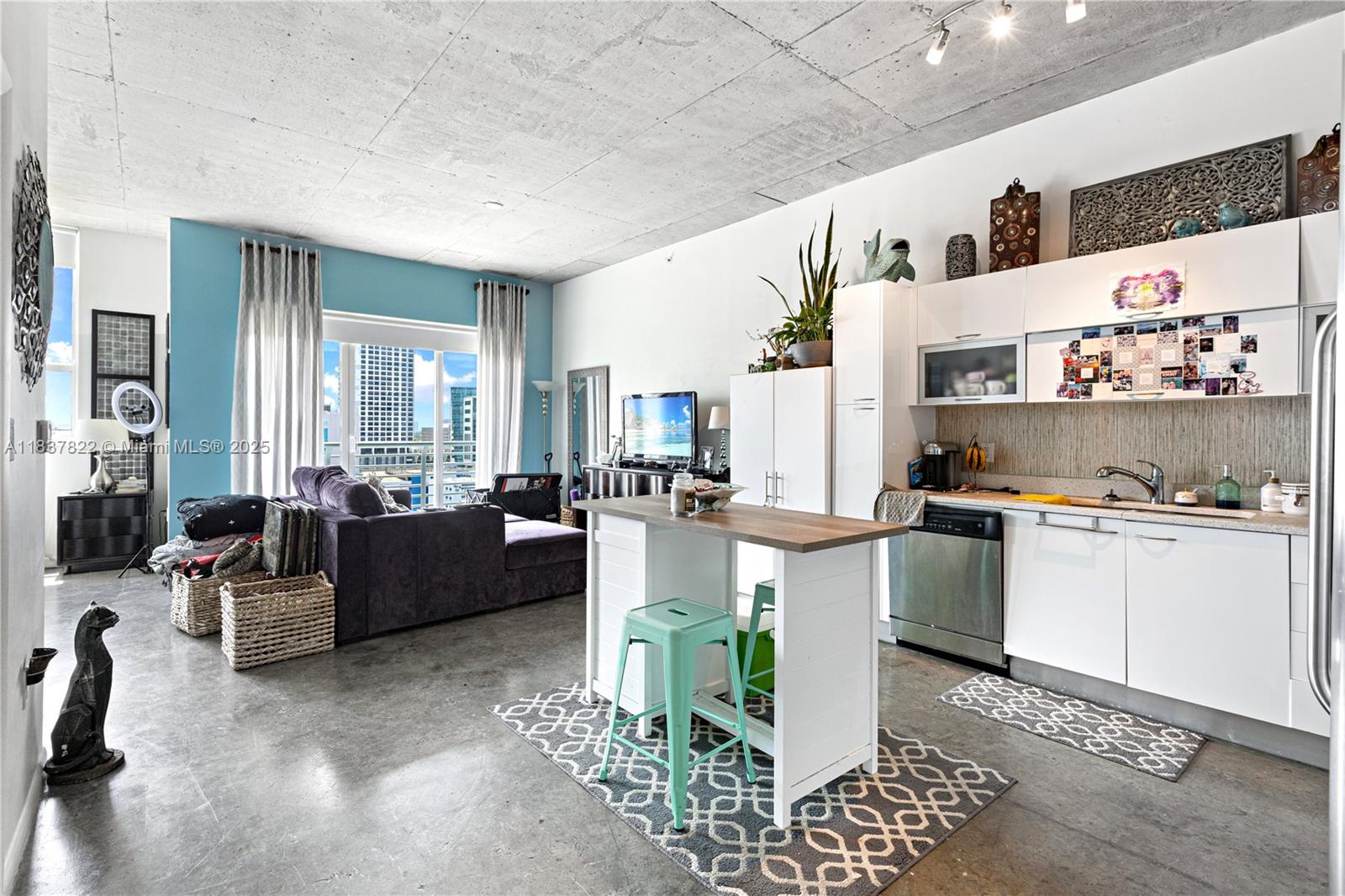 Spacious loft features soaring high ceilings and an open-concept design, complemented by sleek Italian kitchen cabinets and top-of-the-line stainless steel appliances. Building amenities include a rooftop pool with breathtaking views, a lap pool, state-of-the-art gym, dog park, and a stylish lounge room. With 24-hour security and concierge services, you’ll have everything you need at your fingertips. Just minutes to the beach, Brickell, Miami International Airport, and the Design District. An urban oasis like no other!