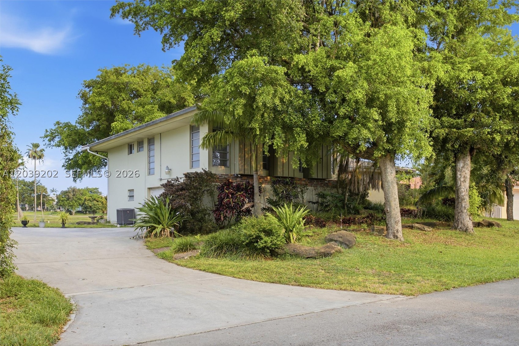 SWEAT EQUITY AWAITS – This charming home sits on a beautiful lot in the sought-after Country Club of Miami Estates. With 2,725 square feet of living space, 3 beds, 3 baths, and an office, there's an opportunity to update and design the home you've always wanted. Yes, this property offers classic Miami character—make it your dream home or investment property. That's exactly why it's priced correctly and offers incredible possibilities in a market projected for continued appreciation. Spanning three levels, the layout provides distinct living, entertaining, and private retreat spaces, with views that invite you to relax and unwind any moment of the day. Bring your imagination and a vision for transforming this jewel into a masterpiece. Location is everything, and this address delivers. Country Club of Miami Estates offers a lifestyle that rivals Coral Gables' prestigious golf communities, and Miami Lakes itself is seeing strong price appreciation. You're buying the location, the space, and the opportunity to build equity in a home you will love.