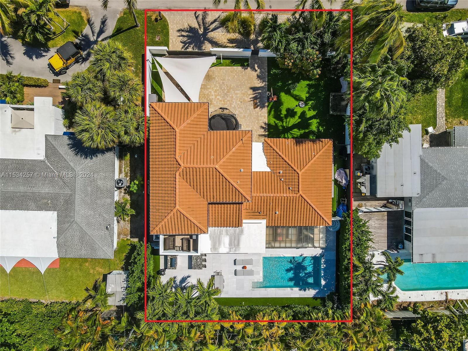 This impeccably remodeled home underwent extensive renovation in 2018/2019, including a new roof, impact doors and windows, new plumbing, electrical systems, and three new AC units. It boasts a new pergola and a fantastic alfresco outdoor kitchen overlooking a beautiful swimming pool and lush landscaping. The kitchen features top-of-the-line Wolf & Subzero appliances, including a chef’s dream gas cooktop. The spacious living room boasts vaulted ceilings. With three bedrooms, three full baths, and an office on the first floor, and the main suite and a family room on the second floor, the layout is both practical and luxurious. The entire property is gated and fenced, offering extra privacy and safety, making it ideal for kids and pets. The house is in pristine condition.