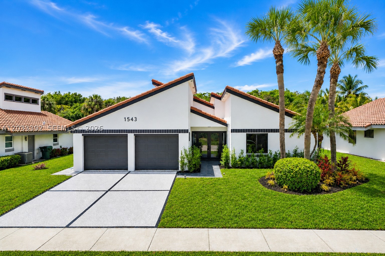 FULLY RENOVATED SINGLE-FAMILY HOME in East Boca Raton!
This 3-bedroom, 2-bath residence features a bright open layout with vaulted ceilings, oversized brand new impact windows and sliders, a striking custom fireplace wall, and a chef's kitchen with Bosch appliances, custom cabinetry, and quartz countertops. Elegant porcelain tile flooring flows seamlessly throughout the living area, enhancing its modern and sophisticated appeal. Recent upgrades include a brand new HVAC system, remodeled bathrooms, new garage flooring, and driveway. Outside, enjoy refreshed landscaping and a private backyard with ample space for a custom pool. Low HOA includes lawn maintenance, and residents enjoy direct access to a community pool. Ideally located minutes from Mizner Park, downtown Boca, beaches, shopping, dining, golf, and top-rated schools.
Some photos have been virtually staged and digitally enhanced.
