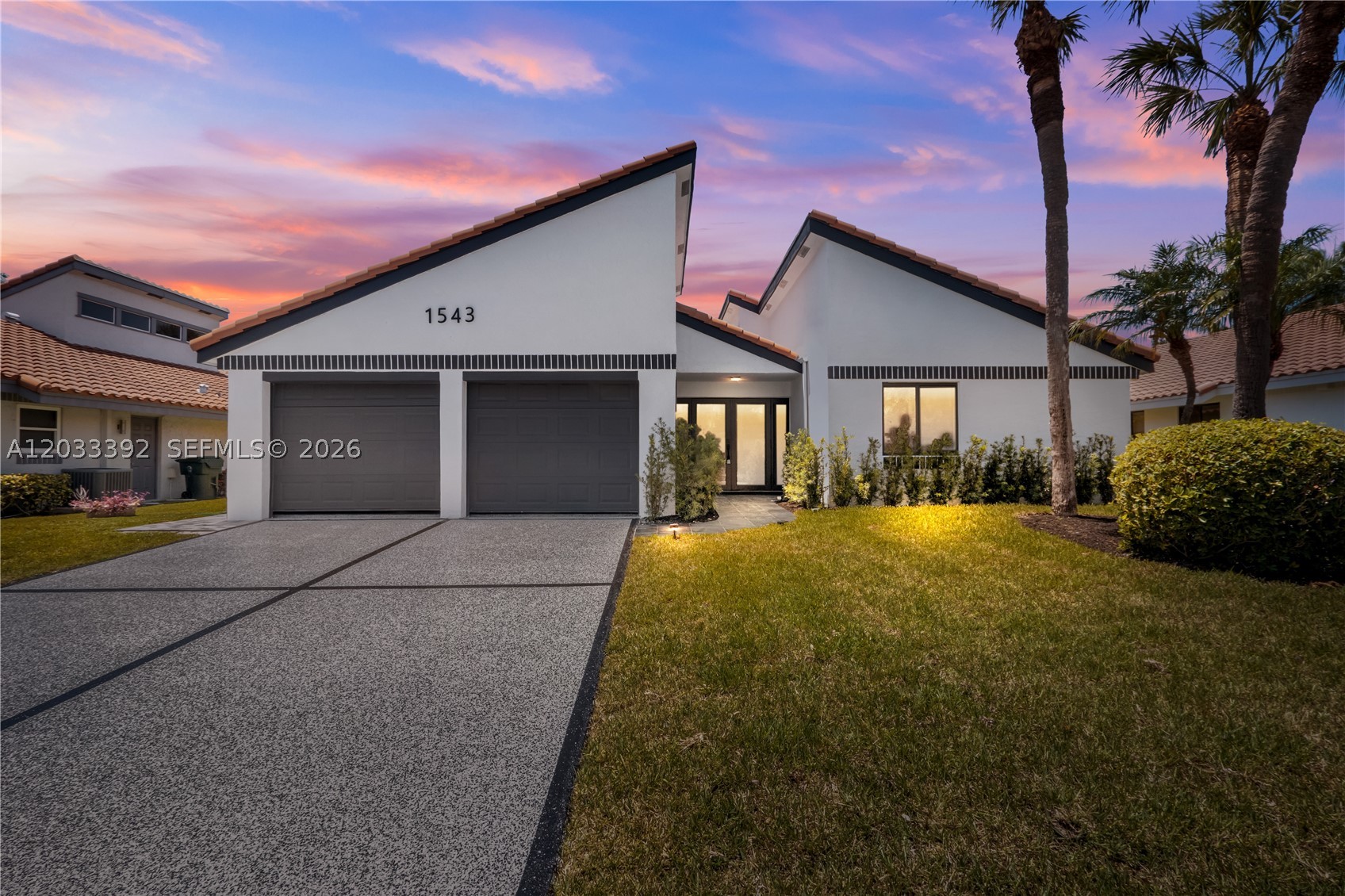PRIME East Boca LOCATION! Fully renovated and move-in ready, this beautiful home is ideally located just minutes from downtown Boca Raton, Mizner Park, beaches, dining and shopping.
This 3-bedroom, 2-bath residence features a bright open layout with vaulted ceilings, oversized brand new impact windows and sliders, a striking custom fireplace wall, and a chef's kitchen with Bosch appliances, custom cabinetry, and quartz countertops. Elegant porcelain tile flooring flows seamlessly throughout the living area, enhancing its modern and sophisticated appeal. Recent upgrades include a brand new HVAC system, remodeled bathrooms, new garage flooring, and driveway. Outside, enjoy refreshed landscaping and a private backyard with ample space for a custom pool. Low HOA includes lawn maintenance, and residents enjoy direct access to a community pool. 
Some photos have been virtually staged and digitally enhanced.

List of all improvements:
- Brand new hurricane-impact windows and doors (2026)
- Top-tier HVAC system - brand new interior & exterior units (2026)
- Comprehensive electrical rewiring throughout the house (2026)
- Well-maintained 2009 roof 
- Upgraded water heater (2020)
- New kitchen with custom soft-close cabinetry, and brand new high-end appliances (2026)
- Tile flooring throughout the living area
- Designer fireplace feature wall
- Fully renovated bathrooms with modern finishes (2026)
- Brand new Electrolux washer and dryer (2026)
- 2-car garage with a new driveway