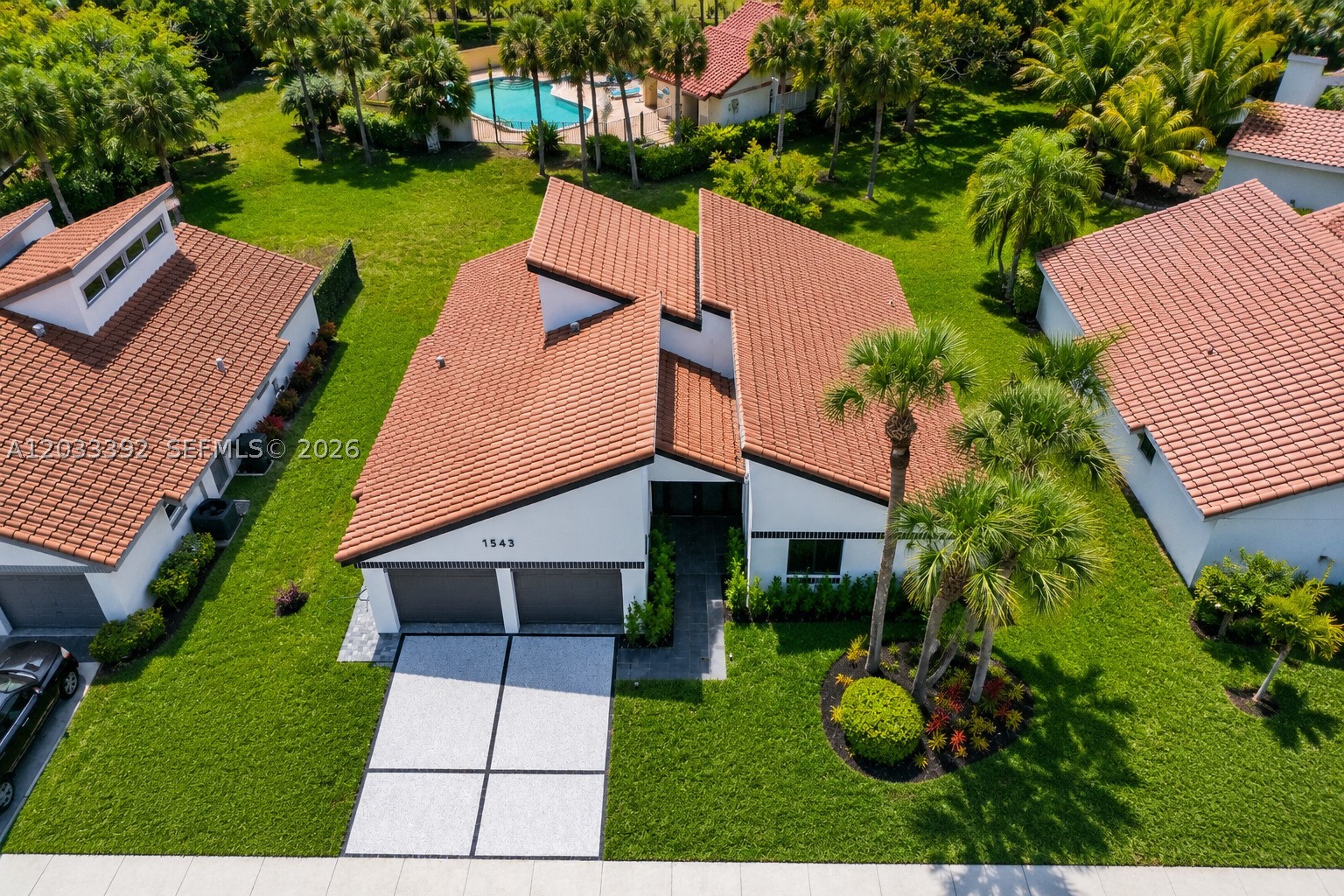 PRIME East Boca LOCATION! Fully renovated and move-in ready, this beautiful home is ideally located just minutes from downtown Boca Raton, Mizner Park, beaches, dining and shopping.
This 3-bedroom, 2-bath residence features a bright open layout with vaulted ceilings, oversized brand new impact windows and sliders, a striking custom fireplace wall, and a chef's kitchen with Bosch appliances, custom cabinetry, and quartz countertops. Elegant porcelain tile flooring flows seamlessly throughout the living area, enhancing its modern and sophisticated appeal. Recent upgrades include a brand new HVAC system, remodeled bathrooms, new garage flooring, and driveway. Outside, enjoy refreshed landscaping and a private backyard with ample space for a custom pool. Low HOA includes lawn maintenance, and residents enjoy direct access to a community pool. 
Some photos have been virtually staged and digitally enhanced.

List of all improvements:
- Brand new hurricane-impact windows and doors (2026)
- Top-tier HVAC system - brand new interior & exterior units (2026)
- Comprehensive electrical rewiring throughout the house (2026)
- Well-maintained 2009 roof 
- Upgraded water heater (2020)
- New kitchen with custom soft-close cabinetry, and brand new high-end appliances (2026)
- Tile flooring throughout the living area
- Designer fireplace feature wall
- Fully renovated bathrooms with modern finishes (2026)
- Brand new Electrolux washer and dryer (2026)
- 2-car garage with a new driveway