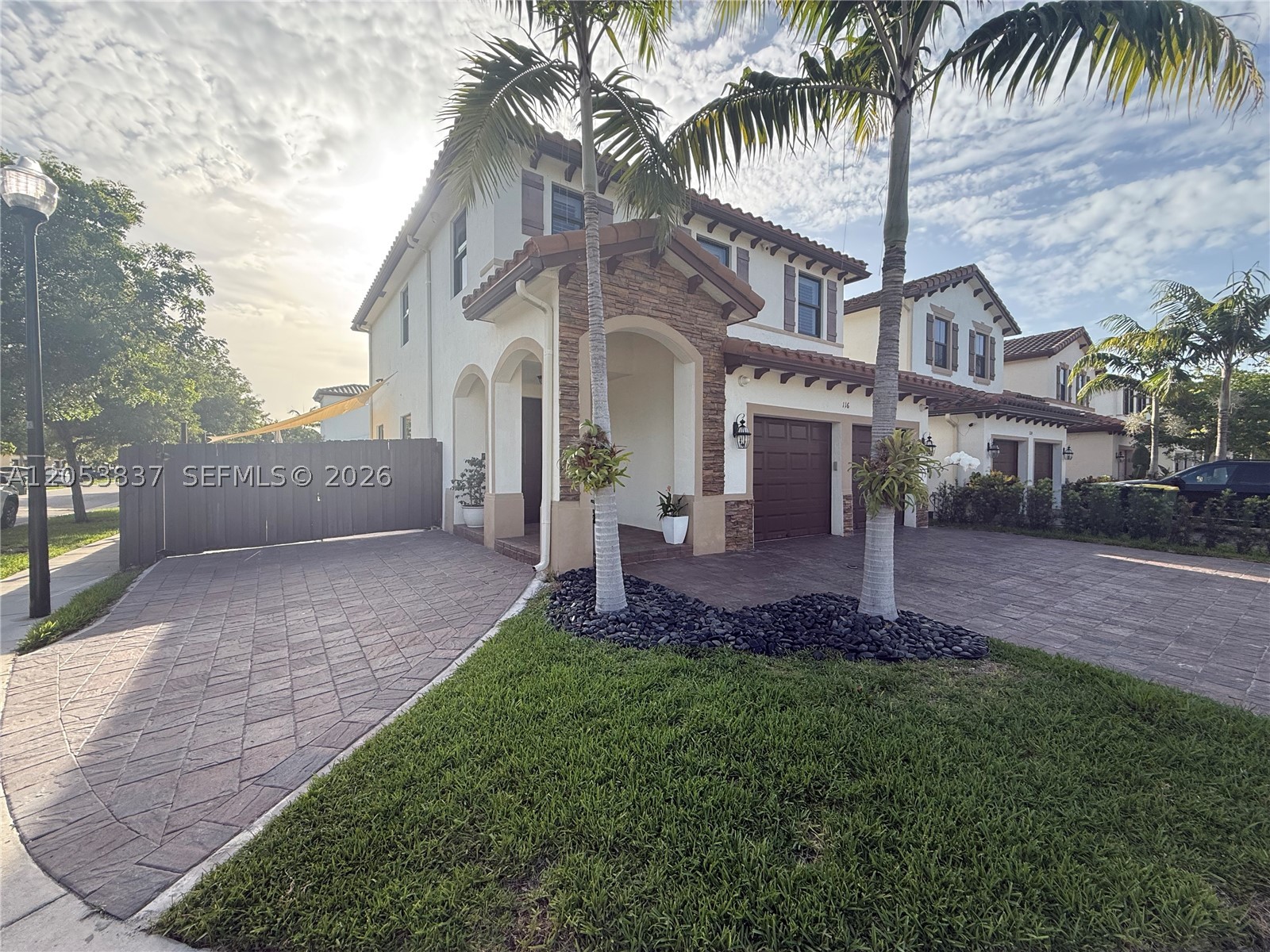 Built in 2018, this model home showcases exceptional craftsmanship and thoughtful upgrades throughout. The seller spared no expense, making this home truly stand out. Located in the sought after, resort-style gated community of Barbados at Oasis, this spacious corner lot property features 5 bedrooms, 2 full bathrooms, 1 half bathroom, extended driveway, and a 2-car garage. The home offers a custom made swimming pool, a gas stove, high-end appliances, and impact-resistant windows and doors for added security and peace of mind. The oversized corner lot also provides ample side yard space, perfect for storing a boat, trailer, or other recreational toys. Don't miss this incredible opportunity to own a move-in-ready home in one of the area's most desirable communities. Please contact the listing agent for showing instructions. A minimum of 24 hours' notice is required for all showings.