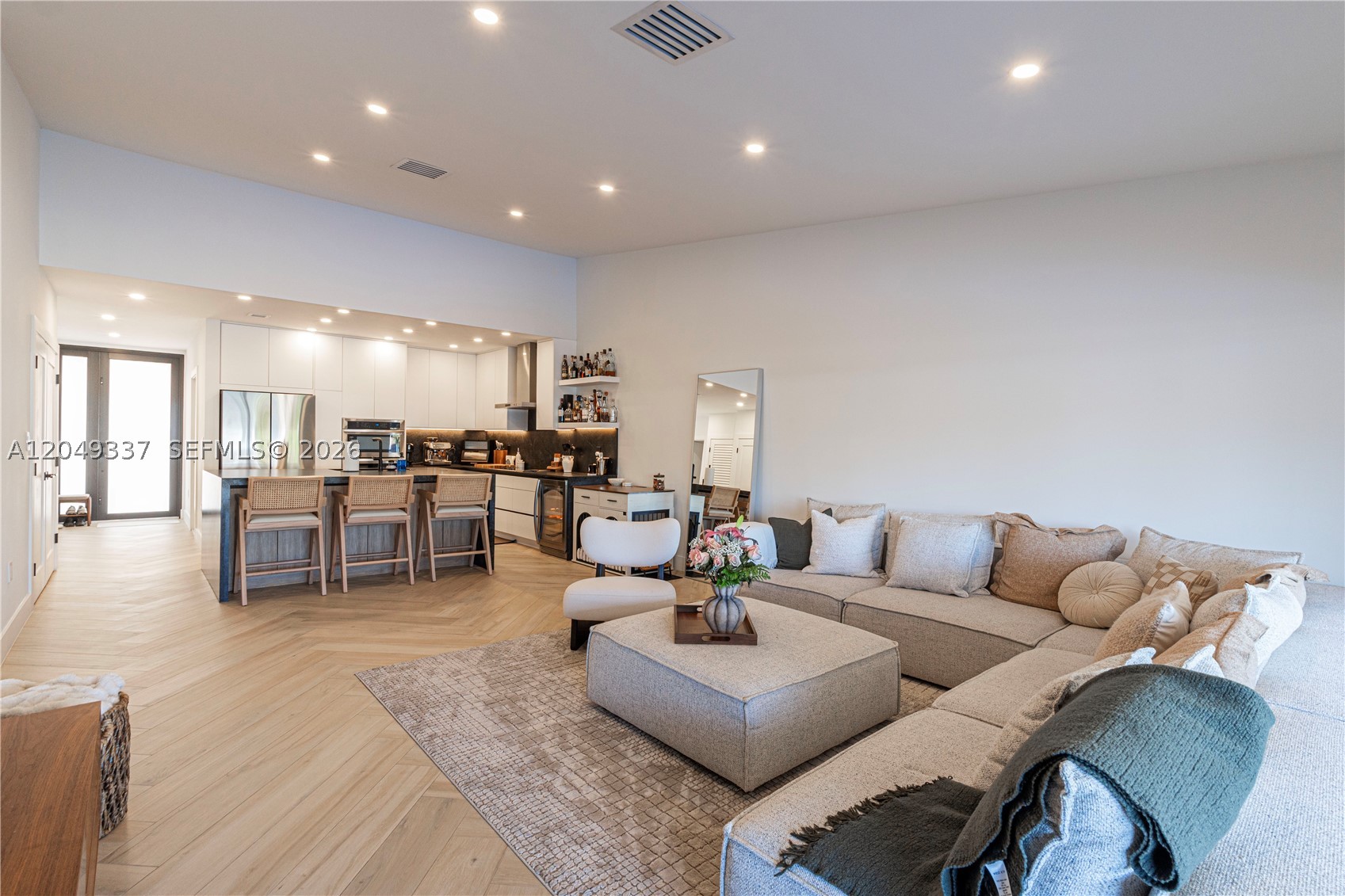 Completely renovated corner-unit townhome with lake views in one of Miami Lakes' most desirable and rarely available neighborhoods! This move-in-ready home features a brand-new kitchen with new Samsung stainless steel appliances, beautifully renovated bathrooms, new herringbone tile flooring throughout, a newer roof, 2025 A/C system, new water heater, smart home lighting system, and custom built-in closets. Offering 2 bedrooms, 2 full bathrooms, a one-car garage, and a dedicated utility room with a washer and dryer, this home combines modern upgrades with a functional layout. Enjoy added privacy as a corner unit and relax on your private terrace overlooking the tranquil lake; the perfect place for your morning coffee or evening sunset. Conveniently located near top-rated schools, parks, shopping, dining, and major roadways, this turnkey property offers the best of the Miami Lakes lifestyle. Homes in this quiet, established community rarely come to market, making this a unique opportunity you won't want to miss. Schedule your private showing today!