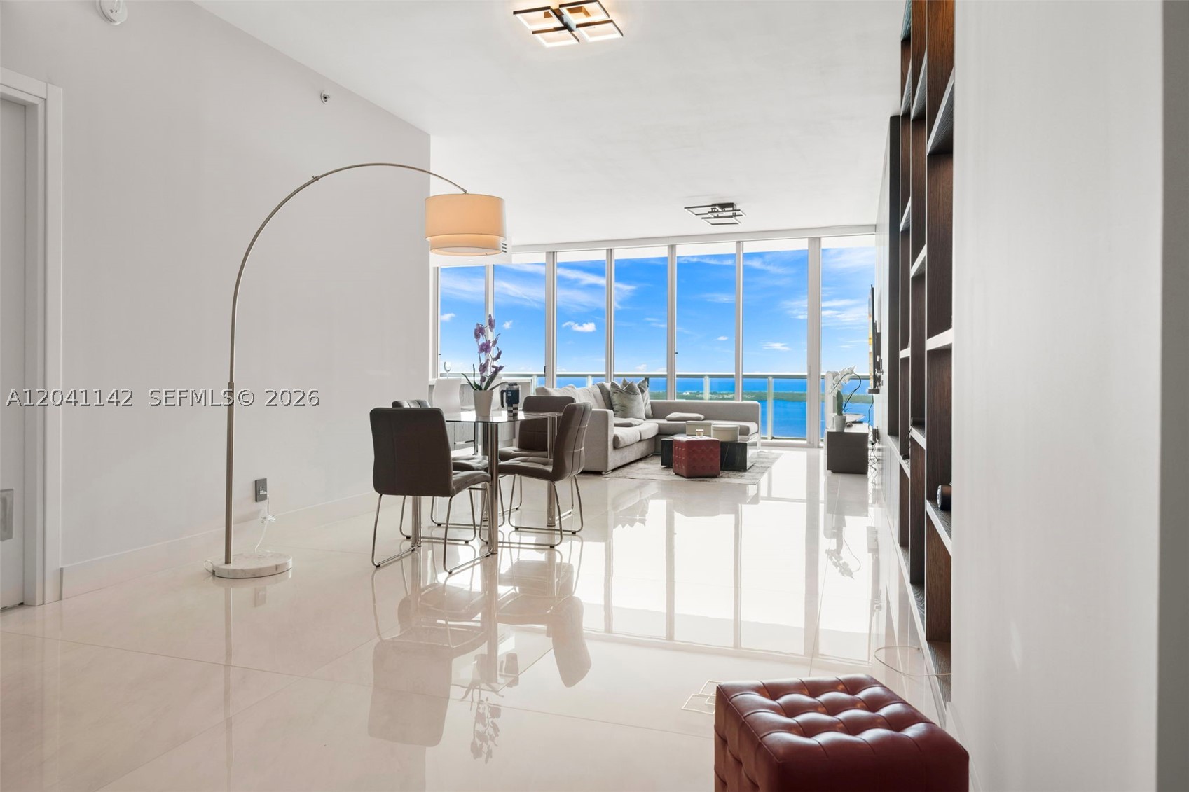 Pre-Penthouse residence just two floors below the penthouse, offering breathtaking unobstructed water views and a spectacular Miami skyline backdrop. Beautifully and professionally renovated with refined finishes and impeccable attention to detail, this sky home blends sophistication, comfort, and privacy. Arrive via a secured semi-private elevator and enjoy elevated living in the heart of Miami, moments from the Arts, Bay, dining, and nature. Private showings only with 48 hours’ notice. An opportunity to own a piece of the Miami Skyline!