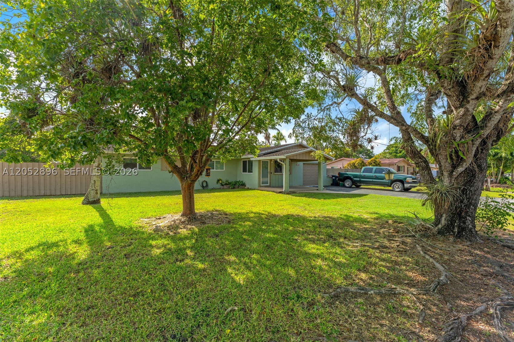 expansive 0.35 acre lot in, no HOA. Bring your boats, RVs and toys. The oversized lot offers endless possibilities: plant fruit trees, with a pool, build a workshop or simply enjoy the space and privacy the Redland is known for. Move-in ready and well maintained, featuring impact windows throughout for peace of mind and insurance savings, plus an A/C system under 5 years old.  The garage is air conditioned, perfect for a home gym, workshop, office or climate controlled storage with impact windows don't last, schedule your showing today!