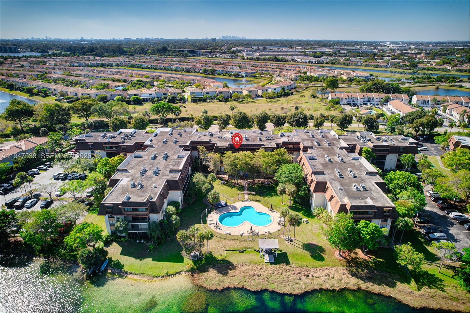 Spacious 3-bed, 2-bath condo with tile flooring throughout. The kitchen opens to a private balcony, perfect for relaxation. The master bedroom features a walk-in closet, and the master bath includes dual sinks and a walk-in shower. Enjoy screened balconies with serene garden, pool, and lake views. Amenities include a clubhouse, common laundry, and a pool.