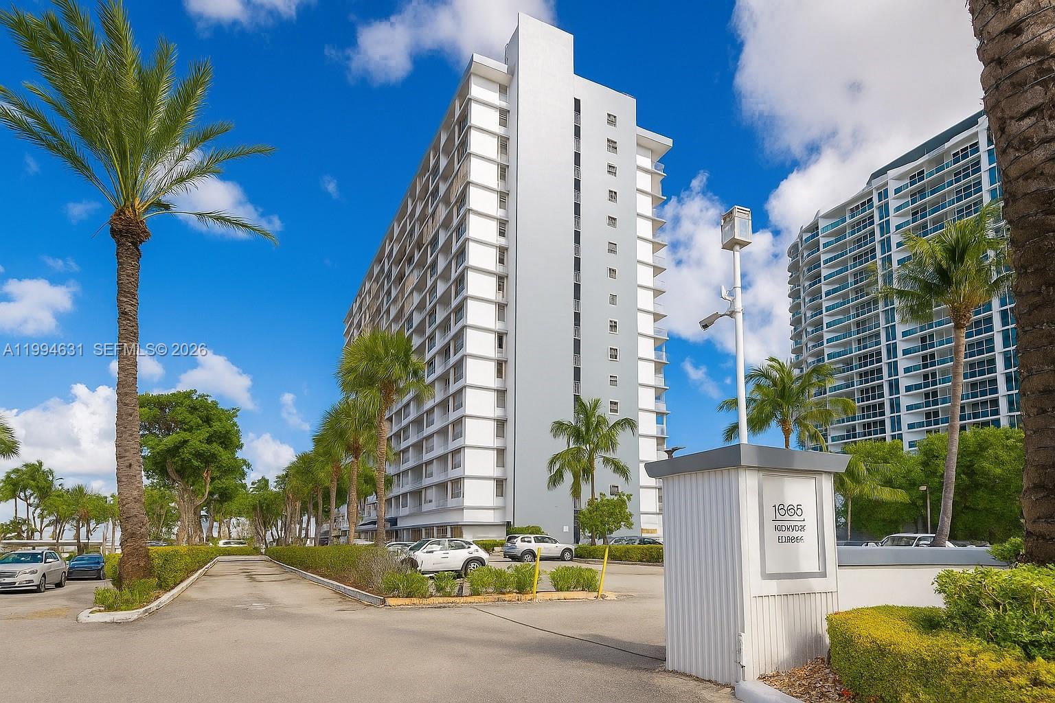 Waterfront Living in Miami's Next Chapter.  Wake up to sweeping views of Biscayne Bay and the Miami skyline in this bright, loft-style condo minutes from the beach. Private balcony, open kitchen with new appliances, marble floors, assigned parking. The building offers a heated bay-front pool, gym, valet, dock, activity room, and laundry on every floor. Currently rented at $2,000/month through January 2027 — turnkey opportunity for investors.  The location is the story. North Bay Village sits on three private islands between Miami Beach and the mainland, in the middle of a generational transformation. Over $2 billion in new development is reshaping the waterfront — the Ritz-Carlton Residences (Related/Macklowe), Continuum Club & Residences, Shoma Bay with a flagship Publix, and the El-Ad bayfront tower — bringing 3,000+ new luxury homes, a marina district, and a hotel to a community of just over one square mile.  10 minutes to South Beach. 15 to Brickell, Wynwood, and the Design District. 20 to MIA. Public transit and the free trolley at your door.
This is the moment before the moment. Pre-construction at the new towers starts above $1M. Owning here today —in an established, fully compliant building — milestone inspection complete, current SIRS on file, no pending assessments  — means the same bay, the same skyline, the same neighborhood, at a fraction of tomorrow's price.