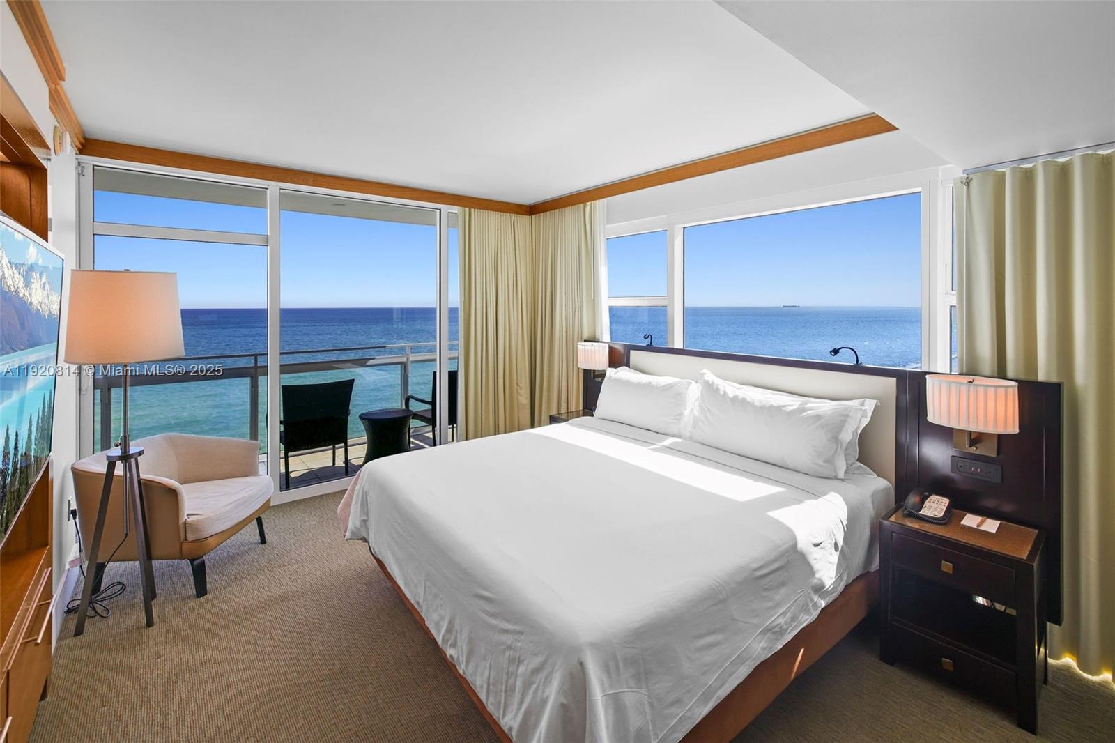 Refined oceanfront living on Miami Beach meets wellness resort at the Carillon Wellness Resort and Residences. This 2 bed, 2 bath residence with incredible direct ocean views from every room are framed by floor-to-ceiling windows. A private balcony invites you to enjoy the fresh ocean breeze, the soothing sound of waves, and provides unobstructed views of the coastline looking both north and south. This beautiful southeast corner unit offers unmatched direct ocean views, 2 separate bedrooms with two en suite baths, and the flexible ability to rent long term or short term.

Owning this residence includes access to the resort’s 70,000 sq ft fitness and spa complex, 100+ weekly exercise classes (Pilates reformer, yoga, TRX, kickboxing, weight training, and more), two on-site restaurants, including the Strand serving breakfast, lunch, and dinner, and a Michelin star award winning concept, on site juice and coffee bar, valet parking, four pools, and a private beach club offering chairs, umbrellas, towels, and food and beverage service, and the hydrotherapy circuit and touchless wellness (cryo, infrared sauna, and more) at the spa.
 
Located directly on the Miami Beach boardwalk with Publix right across the street, and minutes from Bal Harbour Shops, fine dining, and everyday conveniences, this residence offers more than a home—it’s a lifestyle. Daily, weekly, or monthly rentals permitted for this particular condominium hotel residence making it a great investment.
