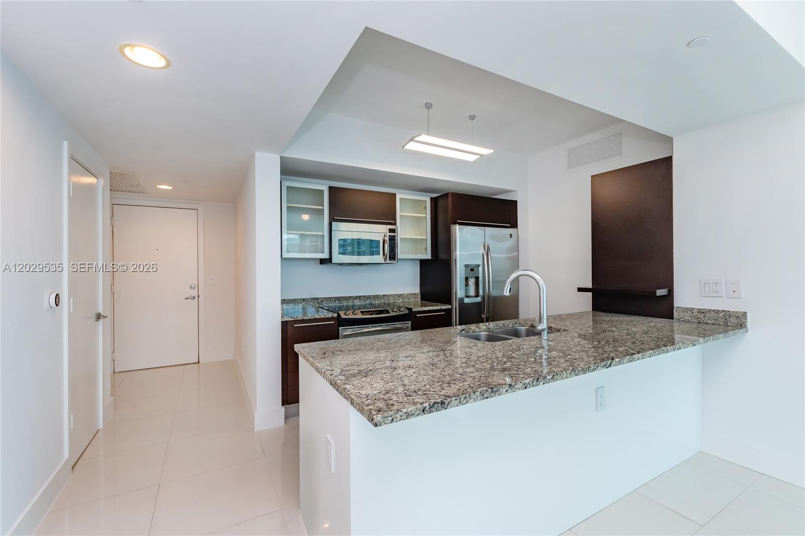 THE PLAZA 901 BRICKELL CO - Residential Lease