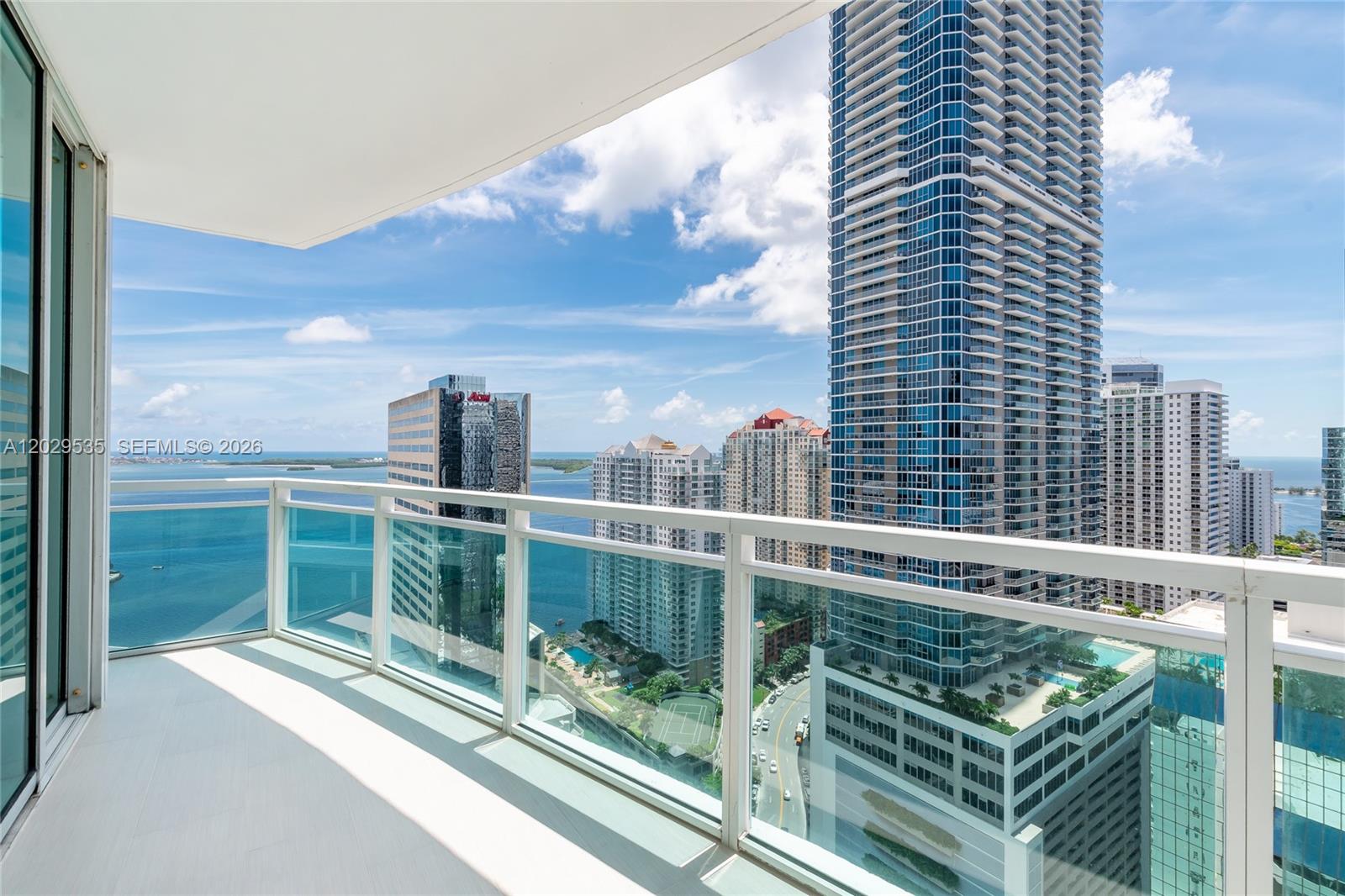 Largest 2-bedroom residence currently available at The Plaza, offering 1,289 sq.ft. of interior living space and the building's largest private terrace with 185 sq.ft. This exceptional 2-bedroom, 2.5-bath residence showcases beautiful bay and city skyline views. Thoughtfully upgraded throughout, features include porcelain flooring, electric blackout shades in both bedrooms, designer kitchen backsplash, full-size washer and dryer, ceramic balcony flooring, and custom-finished closets with built-in shelving and drawers. Meticulously maintained and in pristine condition, this residence feels like new. Rent includes internet, cable, water, and sewer. Residents of The Plaza enjoy an impressive selection of amenities and an unbeatable Brickell location, just steps from premier shopping, dining, entertainment, and the vibrant urban lifestyle that makes Brickell one of Miami's most desirable neighborhoods. Tenant Occupied, Unit will be available for occupancy on September 1, 2026