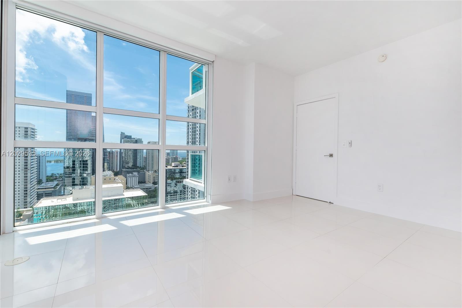 THE PLAZA 901 BRICKELL CO - Residential Lease