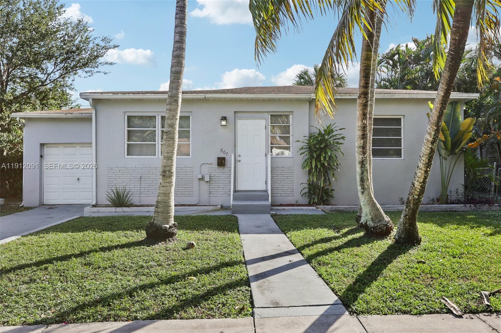 Welcome to this well maintained home in desirable Hollywood. This 2-bedroom, 1-bath residence offers a bright open layout with abundant natural light and tasteful updates throughout. BRAND NEW HVAC INSTALLED (FEB 2026) and Water Heater is 7 years old. The kitchen flows seamlessly into the living and dining areas, creating a comfortable space for everyday living. Enjoy a spacious fenced yard perfect for outdoor dining, gardening, or relaxing. Additional features include a carport, laundry area, and extended driveway. Conveniently located near downtown Hollywood, beaches, parks, shopping, and major highways for easy access to everything South Florida has to offer.