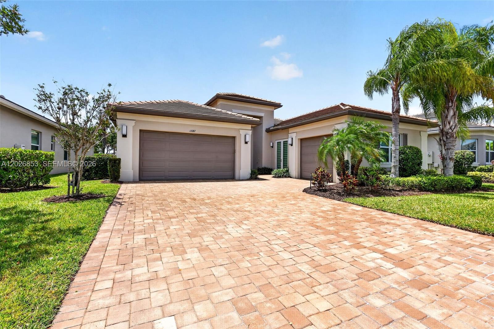 Welcome home to this exquisite, move-in ready CAROLINE model in the highly sought-after Valencia Cay at Riverland, ideally situated along the Paseo. This beautifully upgraded residence features 2 spacious bedrooms, 2 full baths, a half bathroom, a large family/extra room perfect for guests or a potential third bedroom, a private den/office, and a 3-car garage. Designed with both comfort and entertaining in mind, the home showcases numerous upgrades throughout, including a widened driveway with upgraded pavers, an extended screened-in patio, double glass impact entry doors, French doors in the den, additional recessed lighting and hi-hats, and upgraded kitchen cabinetry with a double-door pantry. The gourmet kitchen is the heart of the home, offering a large island, quartz countertops, and an open-concept layout ideal for gatherings. The spacious primary suite features an elegant tray ceiling and a luxurious upgraded bath with a walk-in shower. Enjoy tranquil surroundings with convenient access to Valencia Cay’s exceptional amenities, including the Racquet & Wellness Center, Arts & Cultural Center, and nearby shopping and dining — all less than a mile to a Publix Super Market and restaurants.Experience the vibrant Riverland Lifestyle with access to your newly upgraded Clubhouse bar and restaurant, Over 51 pickleball courts, tennis, bocce, a state-of-the-art fitness center, five  pools, and hundreds of clubs and social activities designed for active living.