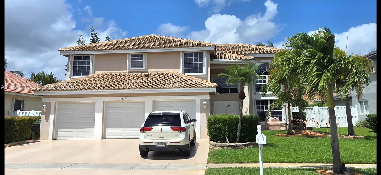 This large four-bedroom, 3 bath home, plus loft, (see floor plan) is very spacious. This gorgeous home has so much to offer starting with an open floor plan, large living room dining room combination, family room with vaulted ceiling, modern kitchen, and breakfast nook. It is completely surrounded by a PVC Fence and two PVC gates Additionally, this home comes with newer roof (Nov 22), hurricane shutters, large kitchen with plenty of countertop space, two pantries, large laundry room with slop sink, closet and washer and dryer.

The 3-car garage has a widened driveway that accommodates parking spaces for 8 cars. The Silver Lakes community, offers the finest A rated schools, a community pool, volleyball, playground and so much more with truly beautiful and pristine natural surroundings for outdoor activities. Located within walking distance to Publix, Walmart, Walgreen's, LA fitness and more. This exceptional value home won’t last long! Don’t miss this opportunity.