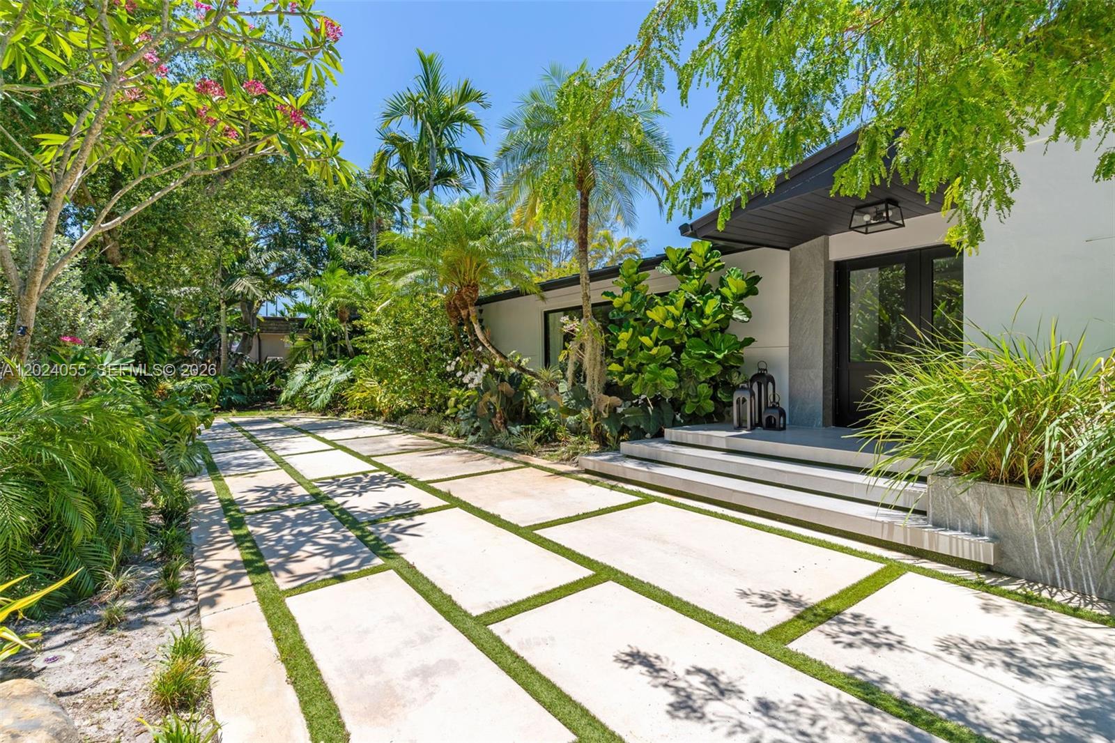 Welcome to one of Pinecrest's most spectacular waterfront homes, where every evening delivers the best sunsets in Miami. A rare combination of luxury, lifestyle, and long-term value in one of South Florida's most desirable neighborhoods. Truly a one-of-a-kind opportunity.

With 140+ feet of water frontage, a floating dock, this property offers direct access to navigate the canals throughout Pinecrest and Palmetto Bay.
This is resort-style living made real. Lounge by the pool overlooking the lake, cast a line and fish right from your backyard, and end the day watching the sky light up over the water.
Completely remodeled from top to bottom. All drainage and plumbing infrastructure has been fully renewed, giving you a turnkey home with no hidden surprises.

Premium features include:
- Brand new metal roof with 20+ year warranty
- State-of-the-art solar panel system with 60+ panels, effectively zero electric bill
- All-new electrical panels with full EV charging connectivity
- All impact windows throughout
- High-end appliances
- Porcelanosa tile flooring throughout the entire home
- Master suite with two walk-in closets and a spa-style bathroom featuring dual showers and dual vanities
- Brand new driveway