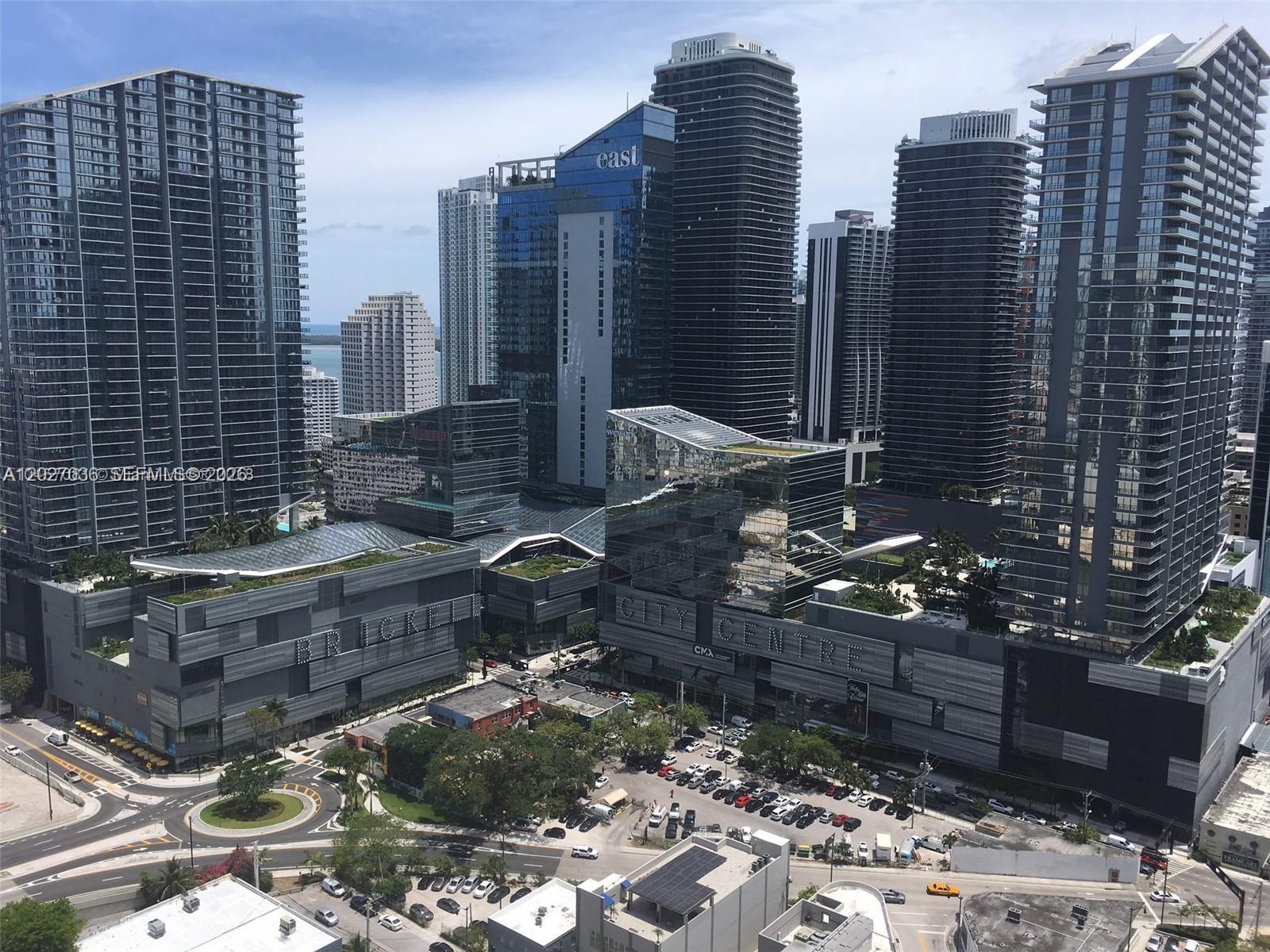 Luxury high-floor residence at the prestigious Mint Condominium featuring breathtaking Miami River and skyline views. This spacious and modern unit offers floor-to-ceiling impact windows, abundant natural light, an open-concept layout, and a private balcony perfect for enjoying sunsets over the city. Contemporary kitchen with stainless steel appliances, sleek cabinetry, and generous living spaces ideal for both relaxing and entertaining. Enjoy resort-style amenities including pool, spa, fitness center, valet, 24-hour security, and concierge services, all within a gated riverfront community just minutes from Brickell City Centre, Downtown Miami, restaurants, nightlife, and major highways.