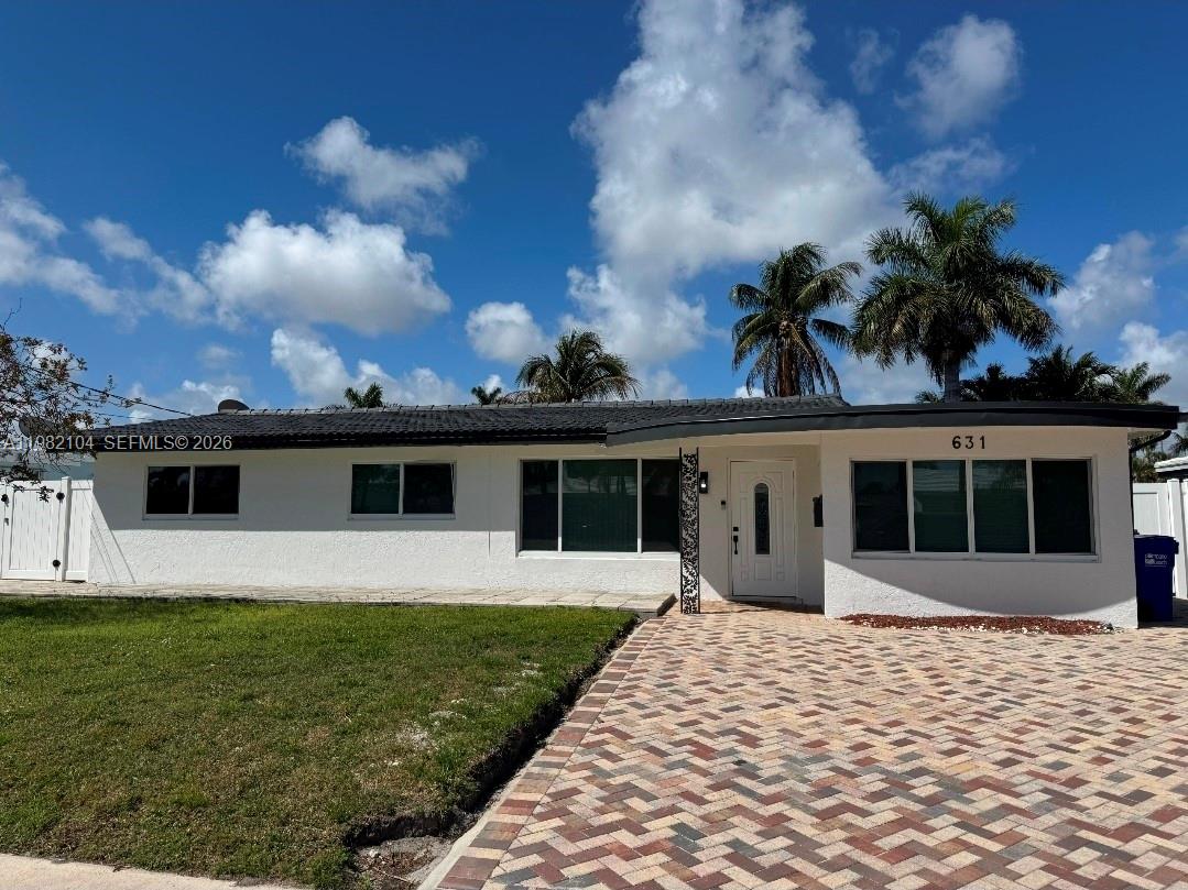 Exceptional waterfront residence completely remodeled and located in a highly desirable exclusive neighborhood with direct ocean access and breathtaking canal views. This elegant 3-bedroom, 2-bathroom home, Designed for the ultimate South Florida lifestyle, the property offers a private pool, spacious outdoor entertaining area, private dock space, and a boat lift for convenient water access. The interior showcases modern finishes and brand-new appliances, including washer, dryer, microwave, dishwasher, refrigerator, and electric range. A rare turnkey opportunity for luxury waterfront living, combining comfort, privacy, and boating convenience in a prime location.

Seize the opportunity to own a premier waterfront residence in the highly sought-after coastal community of Pompano Beach. This exceptional pool home offers 70 feet of direct ocean-access frontage, perfectly designed for boating enthusiasts and those who appreciate the South Florida lifestyle.
 
Enjoy a 40-foot private dock and an 11,000 lb boat lift, ideal for accommodating large center console vessels with hardtops. With only one fixed bridge to navigate—and ample clearance—your access to open water is both convenient and efficient.
