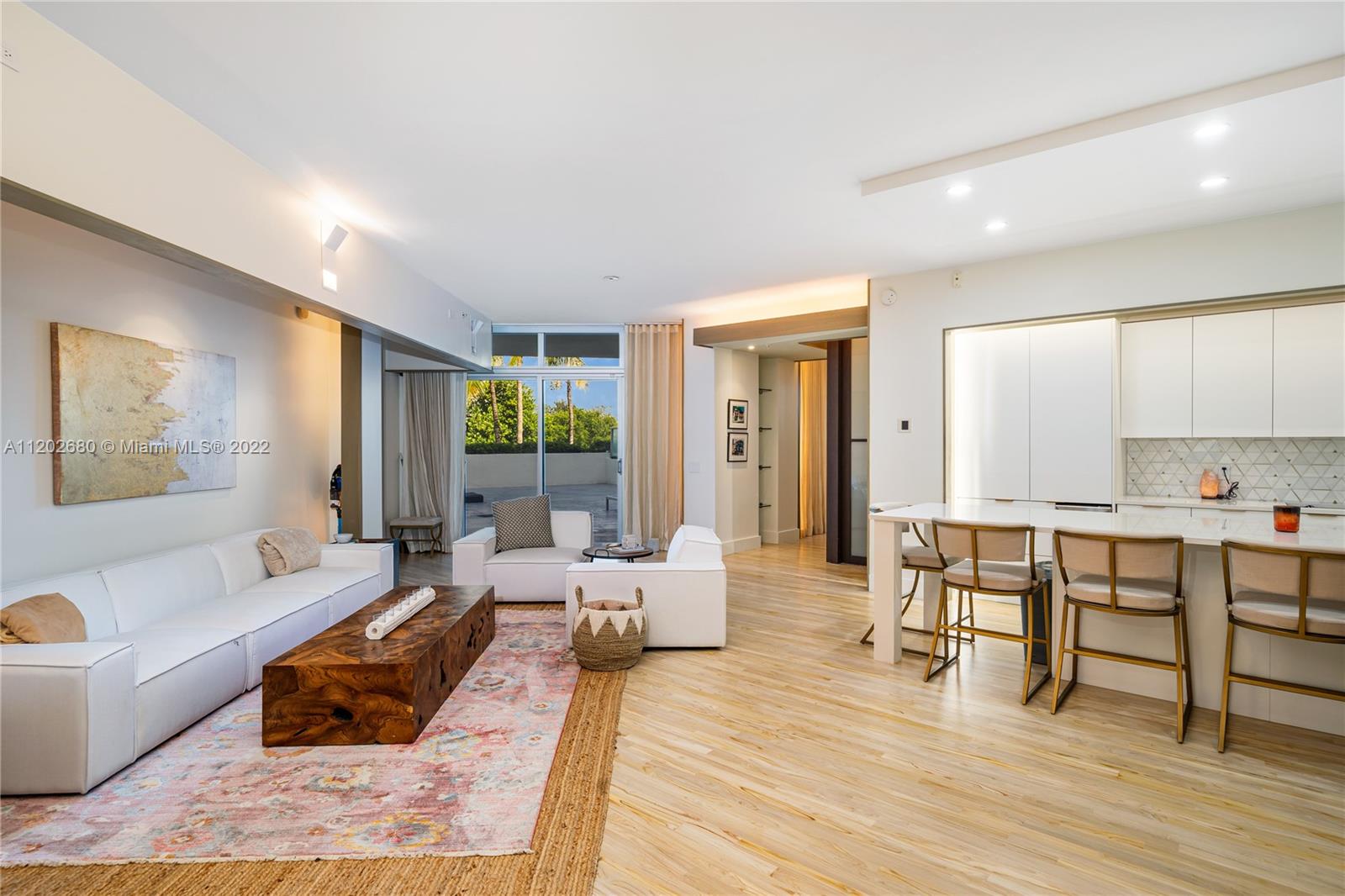 Vibrantly remodeled oversized 2 bed 2.5 bath in South Beach's hottest neighborhood. Experience true indoor/outdoor living with one of the largest terraces in South Beach, 1300+ sq ft outside & 2,058 square feet under AC, condo living that feels like a house. Elegant designer finishes, combination Oscar Glottman/J Design & Styling refine the residence while brand new appliances & light-stained exotic wood give this property the warm beach home look. Bathrooms are spacious with modern marble/stone finishes. Nestled between Lincoln Road, Sunset Harbor & Miami Beach Golf course & minutes to the beach, enjoy the best Miami has to offer. Excellent amenities, 24 hour doorman/security, rooftop pool, gym, too much to list here, come visit while it lasts!