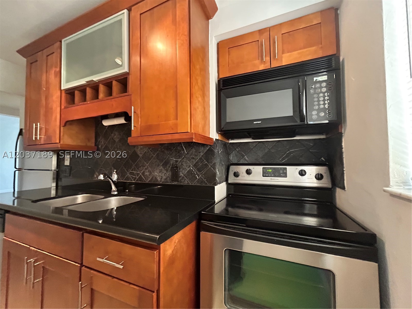 Residence on Pine Tree Drive surrounded by mansions and amenities. One bedroom one bathroom apartment with Cherry wood cabinets and black granite kitchen, stainless steel appliances tile floor, washing/dryer machine inside the unit, and much more. Short walk to shops on 41st street, restaurants, and beaches. Minutes to highways, Downtown, and South Beach.