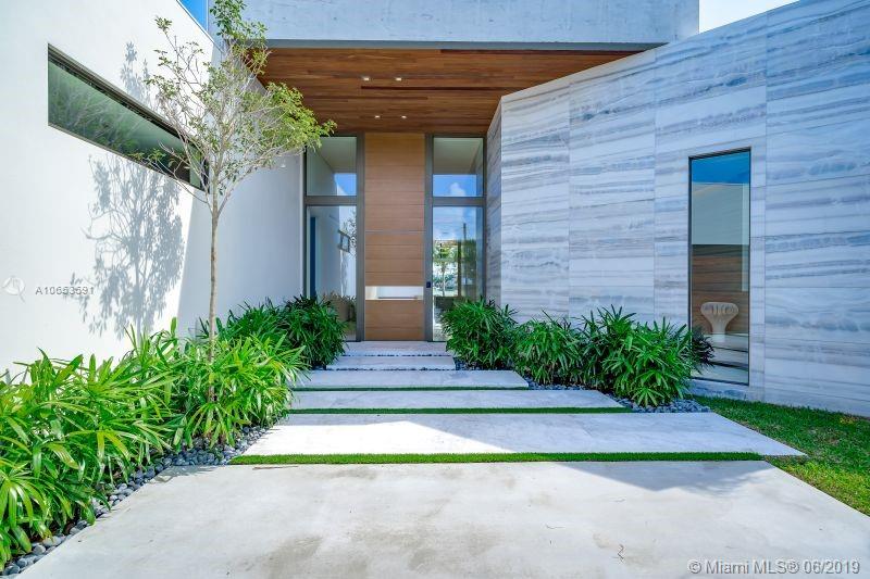 Is it possible to be aggressively stylish and Zen at the same time? This house thinks so! Enjoy a sense of expansive ease all on one level surrounded by warm breezes and approx. 376 feet of water. 10 & 15 ft ceilings and lots of natural light bring joy to every room. Finest materials with time honored craftsmanship (see broker remarks) this home is built to last. Two car garage. Outdoor bar & grill. State of the art smart home features with full security. Automatic entry gate. Abundance of brilliant mature landscaping creates privacy on this almost 20,000 sq-ft lot. Your oasis awaits. Walk to ocean, schools, houses of worship, children's park, shops and restaurants. Created by the vision and dedication to perfection of Gamma Construction and Caterina Badiello Design Team.
