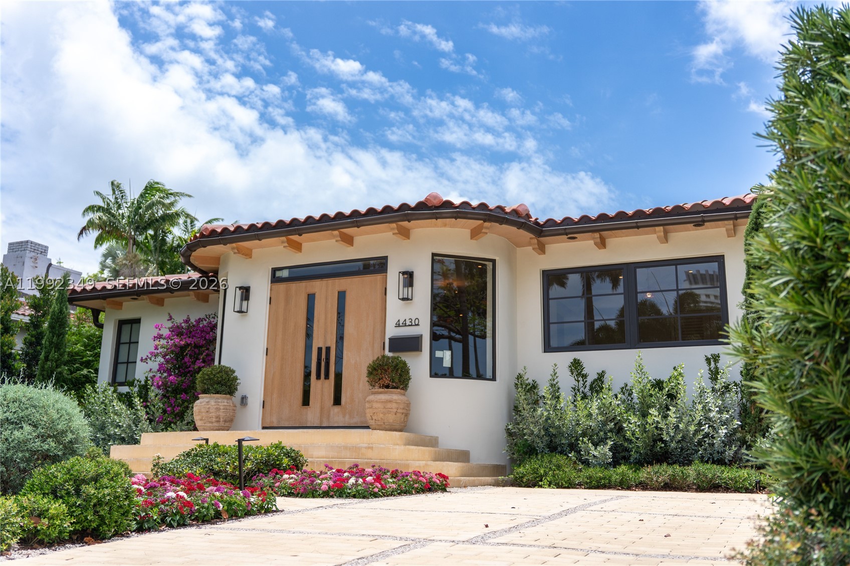Welcome to 4430 Royal Palm Avenue. A Spanish Mediterranean residence reimagined with a warm, modern aesthetic.  

Behind its classic facade lies an entirely renovated home, featuring a new roof, foundation, electrical, mechanical, plumbing, impact windows, doors, underground drainage, and a dedicated generator connection. Offering the charm of a historic home with the performance of new construction.

The interior features a warm palette of white oak, limewash, microcement, and travertine. Layered lighting enhances the home's natural tones and premium fixtures and appliances are by Miele, Monogram, Kohler, and Toto.  

Designed for effortless indoor-outdoor living, the home offers uninterrupted sightlines from entry to garden, filling the interiors with natural light and a sense of calm.

Outdoors, the home is framed in Mediterranean landscaping, including olive and cypress trees, bougainvillea, and silver buttonwoods, all lit with Hinkley lighting. Limestone pavers lead to a brand-new saltwater pool with a sun shelf, all-new equipment, and a heat-and-chill system for year-round enjoyment.

Enjoy Mediterranean living in the heart of Miami Beach.