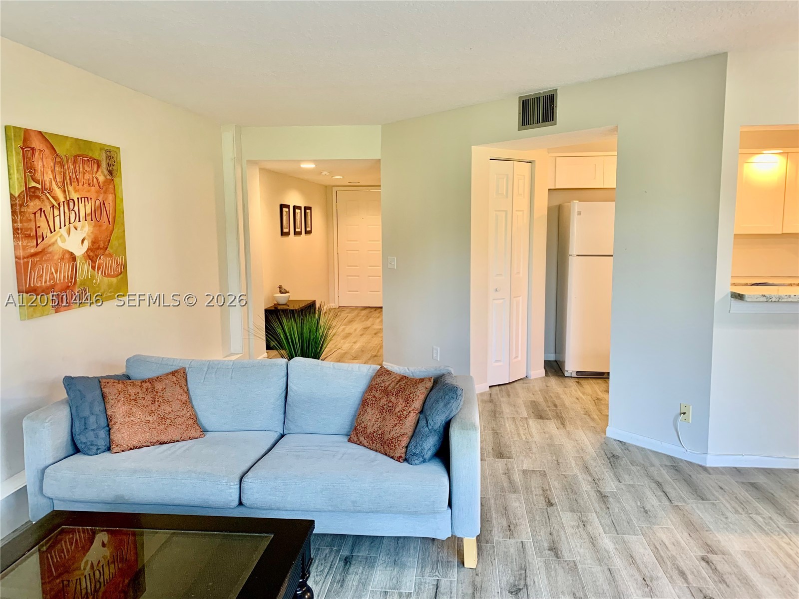 Finally a listing that checks all the boxes: First floor, washer/dryer in unit, parking space right outside your door, golf view, quiet building with exceptional management, walk to pool, fully renovated, full of natural light with a screened in patio to watch the golf carts go by. With the exception of electric, maintenance covers EVERYTHING: water, sewer, cable, internet, trash, landscaping, security, painting, roof repairs, exterior insurance, clubhouse, activities, pickleball, tennis, pools, shuttle transportation to local businesses and shopping, gym, group activities and more. Unit is light, bright, renovated and tastefully furnished. Can purchase furnished, or have everything removed before closing.