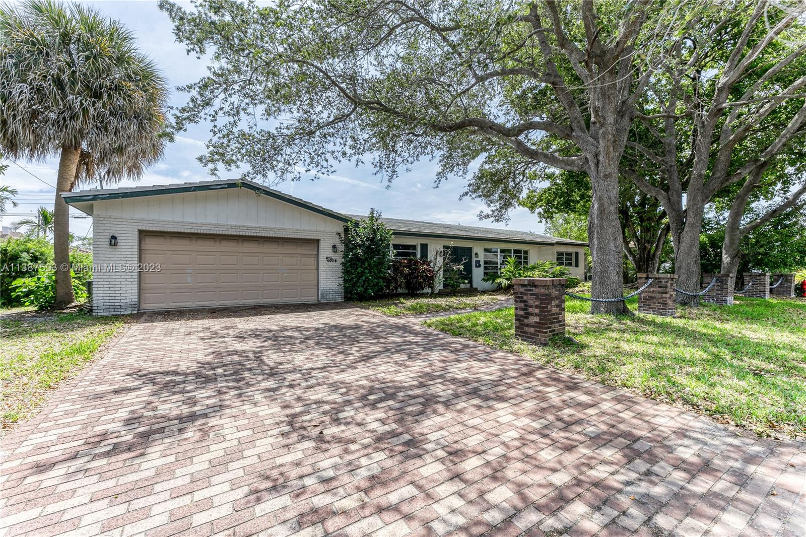 Fantastic opportunity to become a proud home-owner in the prestigious Coral Ridge Country Club! This well-built original home offers endless potential, allowing you to transform it into your personal haven. Featuring a formal living room/dining room, and a generously sized family room, this residence provides ample space for all your needs. The kitchen, has convenient pass-through windows overlooking the screened pool area, offering functionality. The two-car garage houses the washer/dryer and provides additional storage. The property's proximity to the golf course ensures easy access to one of the area's most sought-after recreational amenities. The perfect opportunity to purchase in the coveted Coral Ridge Country Club for under $1,000,000! 
Original Roof. No HOA!