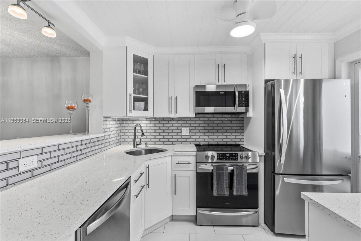 Live one block from the ocean in this beautifully renovated, top-floor 2-bedroom, 2-bathroom condo in the heart of Pompano Beach’s revitalized beachfront district. Located in a non-flood zone with full hurricane protection, this well-maintained, remodeled residence offers peace of mind along with style and comfort.

Inside, you’ll find a bright split-bedroom layout, easy-care tile flooring throughout, a new kitchen with quartz countertops, and a fully turnkey feel that makes moving in effortless. Whether you are looking for a primary residence or a beachside retreat, the layout offers privacy, functionality, and natural light.

Oceanside North is a friendly, welcoming building known for its social atmosphere and strong sense of community. The association is fully certified with full reserves in place. Amenities include private beach access, a heated pool with BBQ area, common laundry, and private storage.

Just a short walk to the beach, dining, shopping, boating, fishing, biking, and the iconic Pompano Beach Pier. Surrounded by exciting new luxury developments, this area continues to grow in value and vibrancy. No leasing. All ages welcome. Maintenance fee includes full reserves. Enjoy the best of coastal living with convenience, security, and lifestyle all in one.