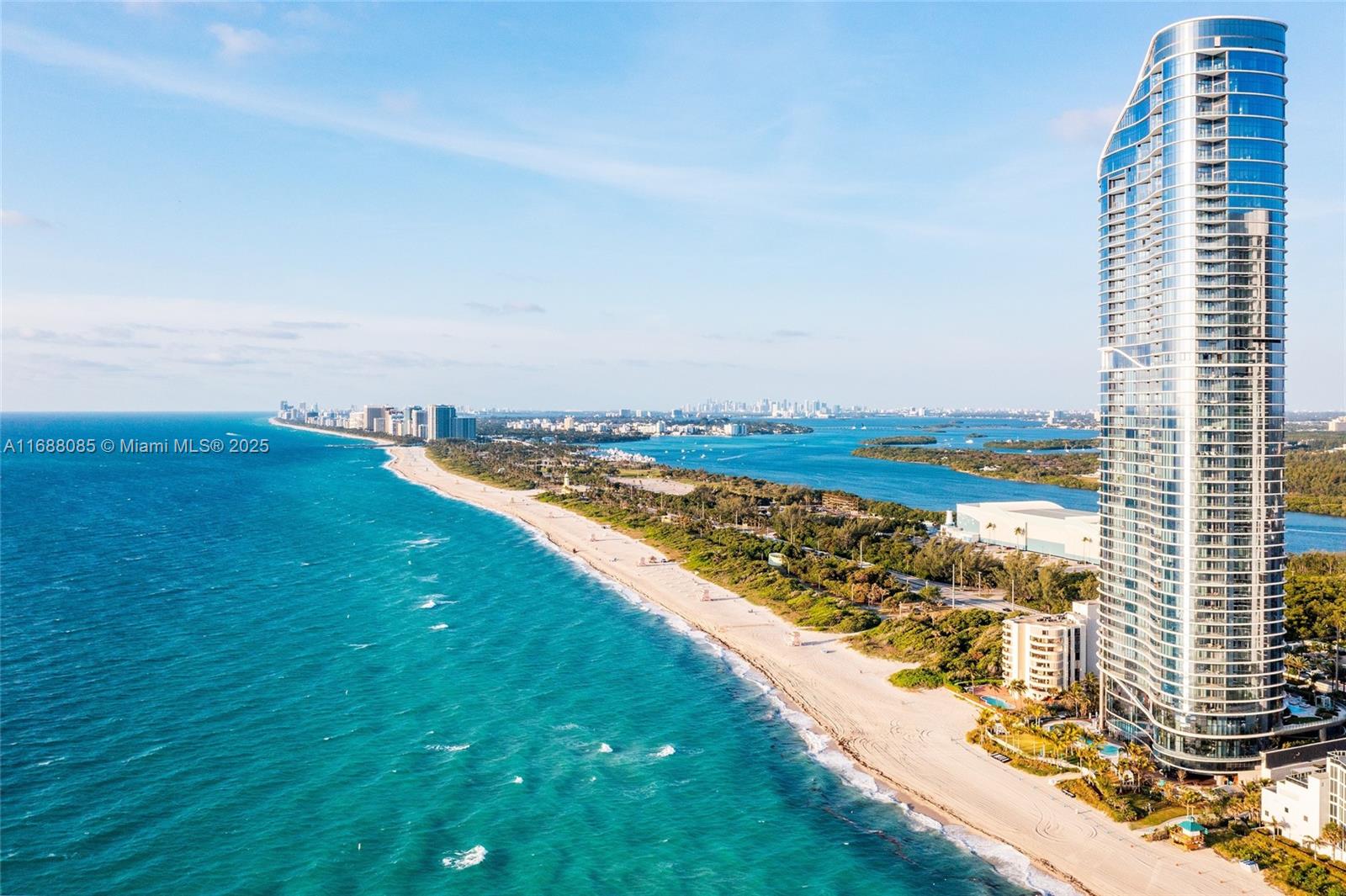 Dramatic 13-FOOT Cathedral Ceilings and Breathtaking Unobstructed Panoramic Views await in this rare 48th-floor unit at the Ritz-Carlton Sunny Isles. Fully remodeled by interior designer Graciela Dayan, this 3-bed, 4.5-bath residence features expansive terraces and stunning ocean & city views through 13-foot floor-to-ceiling windows. Every detail exudes elegance, from the custom Italian millwork and white oak herringbone wood floors to Calacatta Viola marble, a custom fireplace, and Gaggenau appliances. The Ritz's signature amenities include: Private Elevator, 24hr Concierge, valet, spa, fitness center, beach/pool svc, 2 pools & restaurant. Luxury Living at its finest.