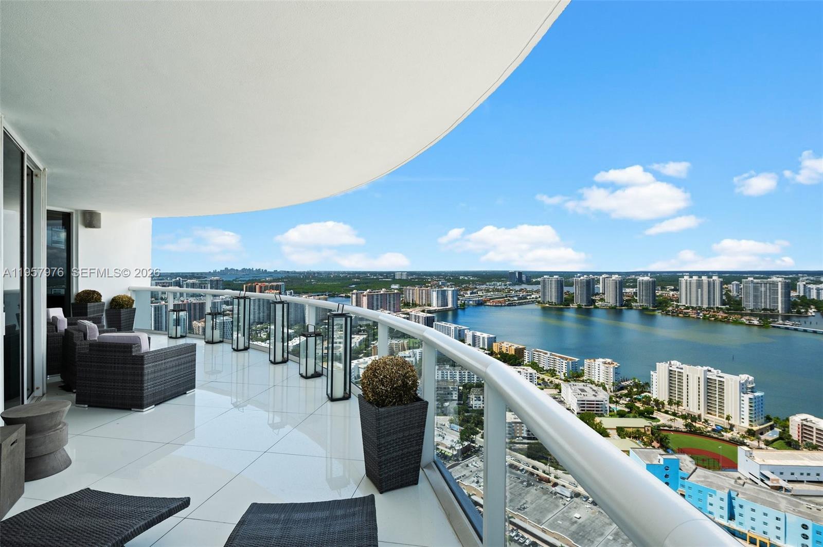 JUST REDUCED — New pricing creates a compelling opportunity for a 3,080 SF high-floor oceanfront residence in Sunny Isles Beach with panoramic ocean, Intracoastal, and skyline views. Experience elevated coastal living in this expansive 3-bed/3.5-bath residence plus den/media room or office. Designed for comfort and sophistication, the home features a desirable split-bedroom floor plan with a private primary suite on one side and two additional bedrooms on the other, ideal for family living, guests, or extended stays. Bright, open living and dining areas are framed by floor-to-ceiling glass, filling the home with natural light and showcasing endless water views. 
Spacious kitchen and living areas flow seamlessly to an oversized balcony, creating a beautiful indoor-outdoor living experience. Residents enjoy direct private beach access and resort-style amenities, including a beautiful pool and fully equipped fitness center. 
Built in 2004, this well-established luxury building offers an ideal blend of modern comfort, beachfront lifestyle, and long-term value. Minutes from world-class dining, shopping, and entertainment, this exceptional property is a rare opportunity to own a large-format oceanfront condo in Sunny Isles Beach. Perfect as a primary residence, seasonal retreat, or luxury investment. 
Easy to show.