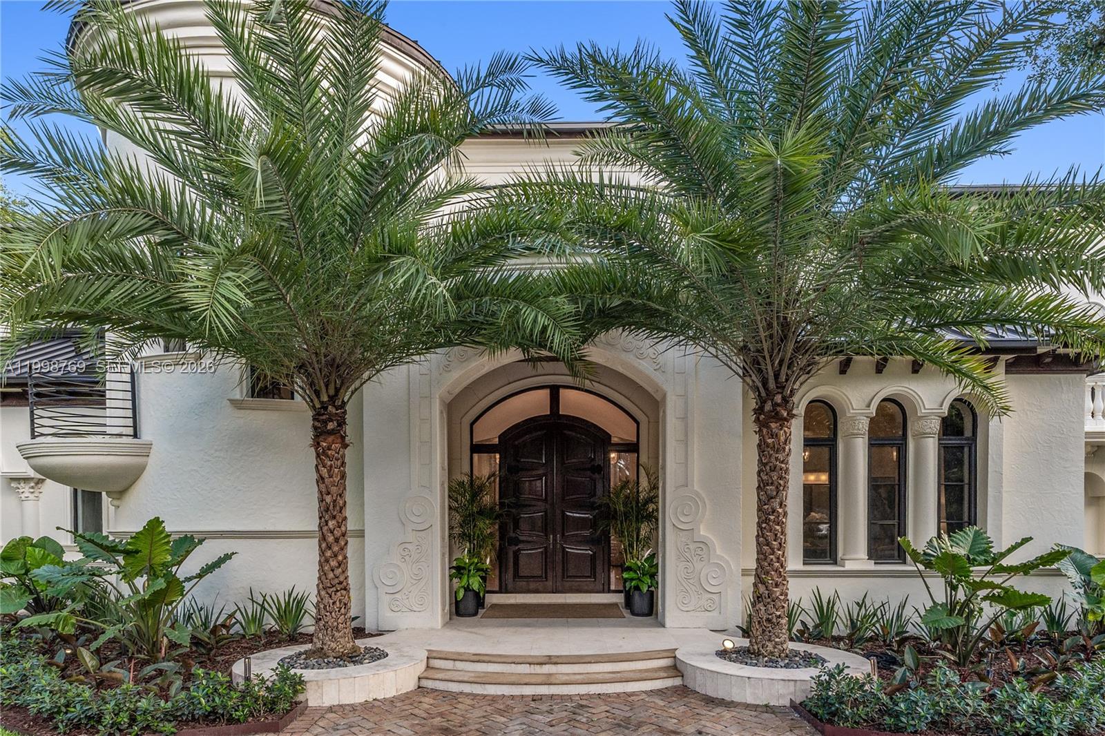 Extraordinary and the finest! Experience unparalleled luxury in this newly complete European style masterpiece, situated on a lush, private acre. This sprawling estate features 6 oversized bedrooms and 8.5 designer baths, defined by soaring ceilings and a flood of natural light. Stunning formal living and dining rooms, executive office/library, double sided fireplace, billiard/game room, wine cellar, bar. The heart of the home is a spectacular epicurean gourmet kitchen with premium appliances and marble countertops, seamlessly flowing into the expansive entertaining area. Architectural excellence is on display with English hardwood floor, rich and dark wood custom paneling and meticulous built-ins. Retreat to the exquisite primary suite, a true sanctuary with sitting area, a spa-like sumptuous master bath, large walk-in closet, and exercise/work out room. Second floor media/playroom with kitchen and additional laundry facility and balcony. Thoughtful floor plan with additional spacious  5 ensuites affords the family living with modern comforts. Spectacular  spacious patio with complete kitchen and grill and inviting freeform cascading pool/spa. Magnificent grounds and landscaping. 4-car garage. This is a rare opportunity to own a modern legacy home defined by  scale, beauty, quality and sophistication.