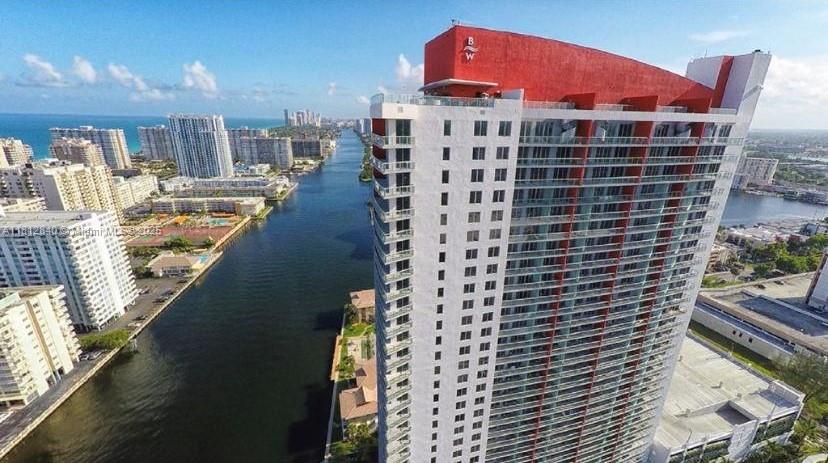 Experience Luxury Resort Living at the Beach. Soak in the stunning views of the Ocean, Intracoastal, and City Skyline from this beautiful 20th-floor 2-bedroom suite featuring two full bathrooms. It can be rented as two separate units or combined for enhanced occupancy and rental income, whether short-term or long-term. This residence showcases a warm, classic interior with Italian furnishings, floor-to-ceiling windows, and an open kitchen with high-end appliances. Enjoy Resort-style hotel amenities, including a private rooftop infinity pool deck with cabanas, valet services, a state-of-the-art fitness center, a theater with Intracoastal views, and a shuttle service to and from the beach. This property offers easy access to excellent restaurants, the beach, and vibrant nightlife.