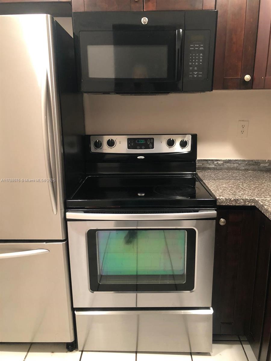 Spacious 2 bed, 2 bath unit in gated community. Located on the first floor. Tile floors, stainless steel appliances, granite counter tops, upgraded bathrooms. Great location, enjoy many amenities, laundry facilities on every floor, management on-site, pool, tennis court, fitness room, 24/7 security guard at gate. Pets up to 40 lbs allowed. 1 assigned parking space, additional parking can be rented + guest parking. Unit is rented $1925 monthly until 1/31/27.