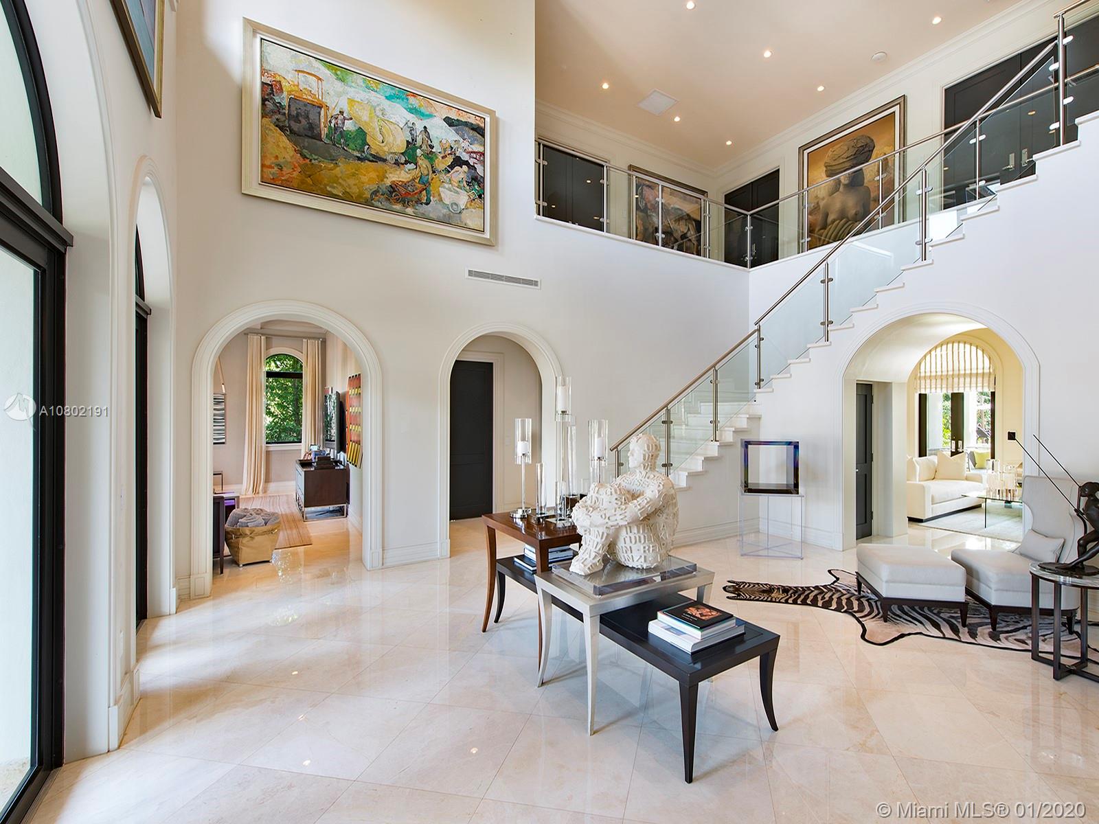North Pinecrest Italianate Architecture Mansion!  This nearly 8,000 sq ft home has 8 bedrooms, 9.5 bathrooms and boasts top of the line finishes throughout, including its expansive kitchen and living areas. Most desirable street in North Pinecrest with flow through entrances on 94th & 96th street. Short distance from South Miami, Coral Gables, and Coconut Grove with excellent schools, restaurants, shops, and so much more. Its large resort style pool and club house gazebo are perfect for enjoying a lifestyle that blends its interior and the outdoors, along with providing a perfect space for entertaining family and friends.