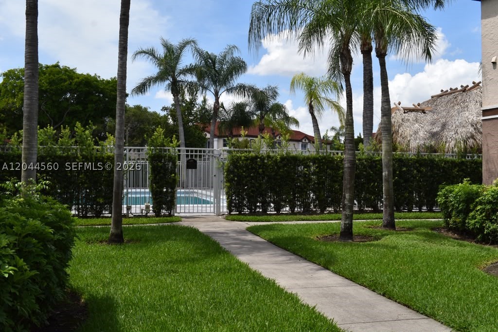 Affordable 2/2 ground-floor corner unit in the middle of Pembroke Pines, waiting for new owners to make it their own. Ceramic tiles and laminate flooring in bedrooms.  The unit has its own washer and dryer in the unit.  Walking distance to the pool.  One assigned parking space and guest parking are available.  Walking distance to shopping. The association fee includes water, pest control, pool, pest control, cable, exterior building maintenance & insurance. Investor-friendly, competitive rentals in the area can be rented during the 1st year of ownership. Buyer incentives available. Easy to access.  Make an appointment to view today.